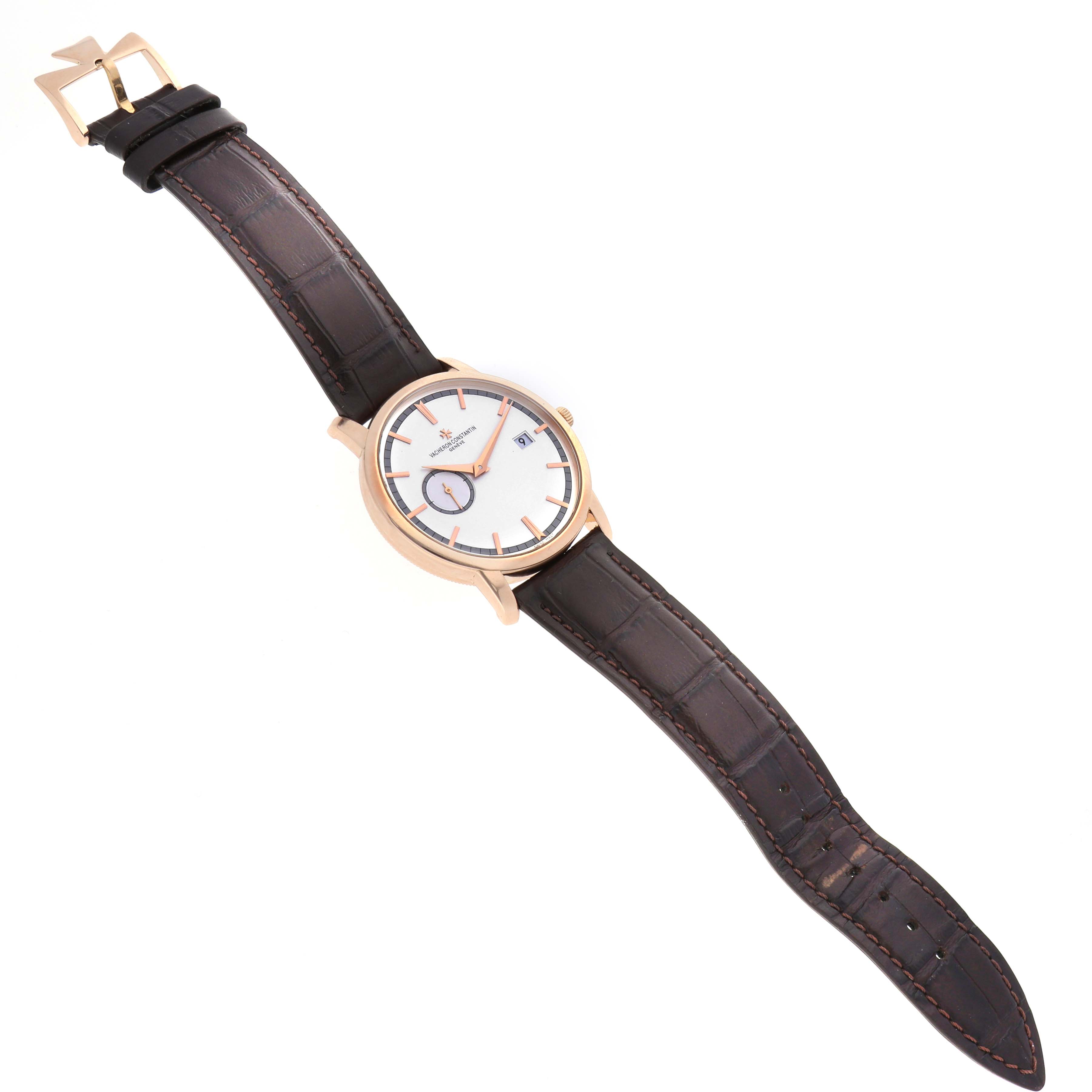 The Vacheron Constantin Traditionnelle 87172 Men's Rose Gold Silver Dial watch is shown at an oblique angle, displaying its face, case, and leather strap.