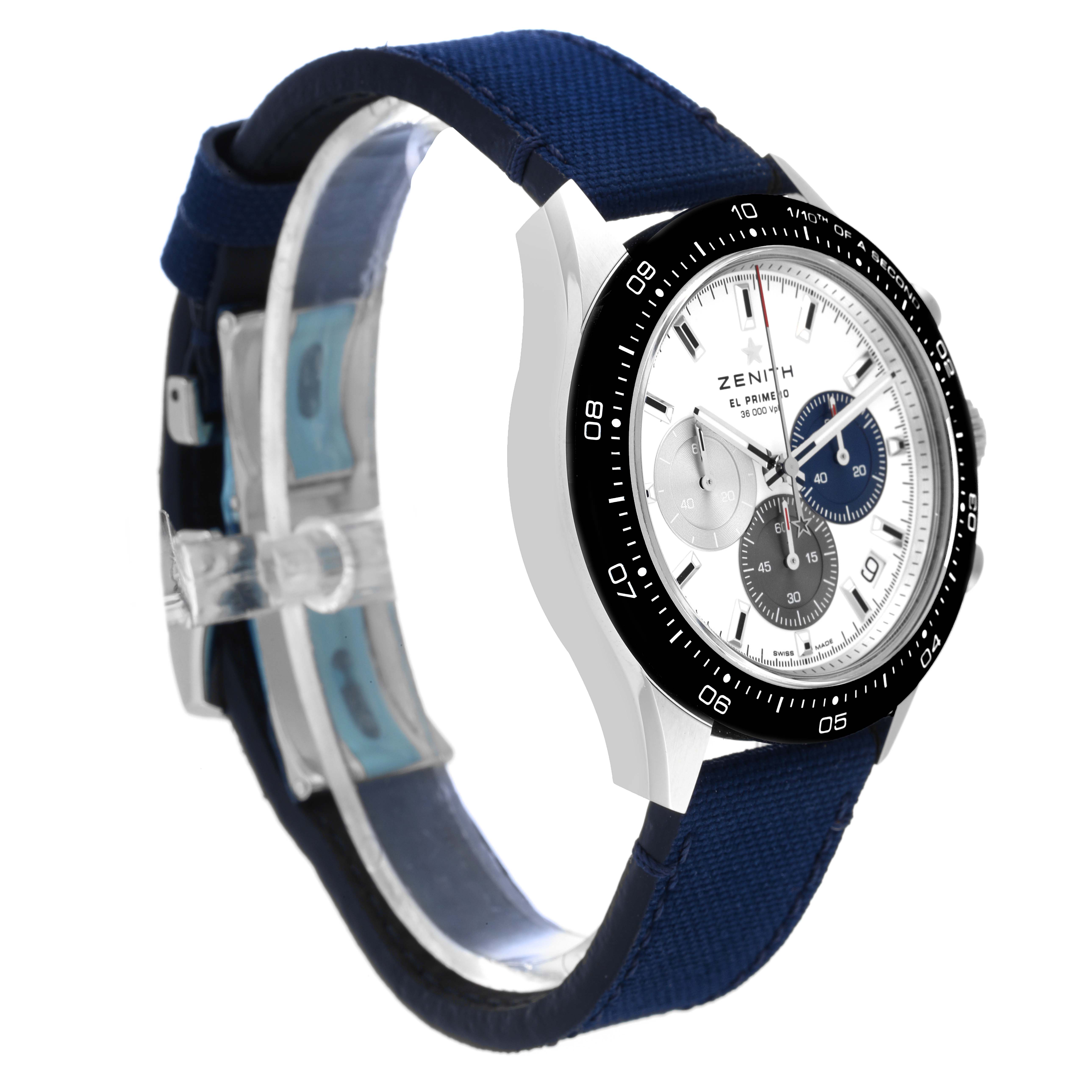 The Zenith Chronomaster 03.3100.3600 Men's Stainless Steel White Dial 03.3100.3600 Men's Stainless Steel White Dial watch is shown from an angled side view, displaying its face, bezel, and blue strap.