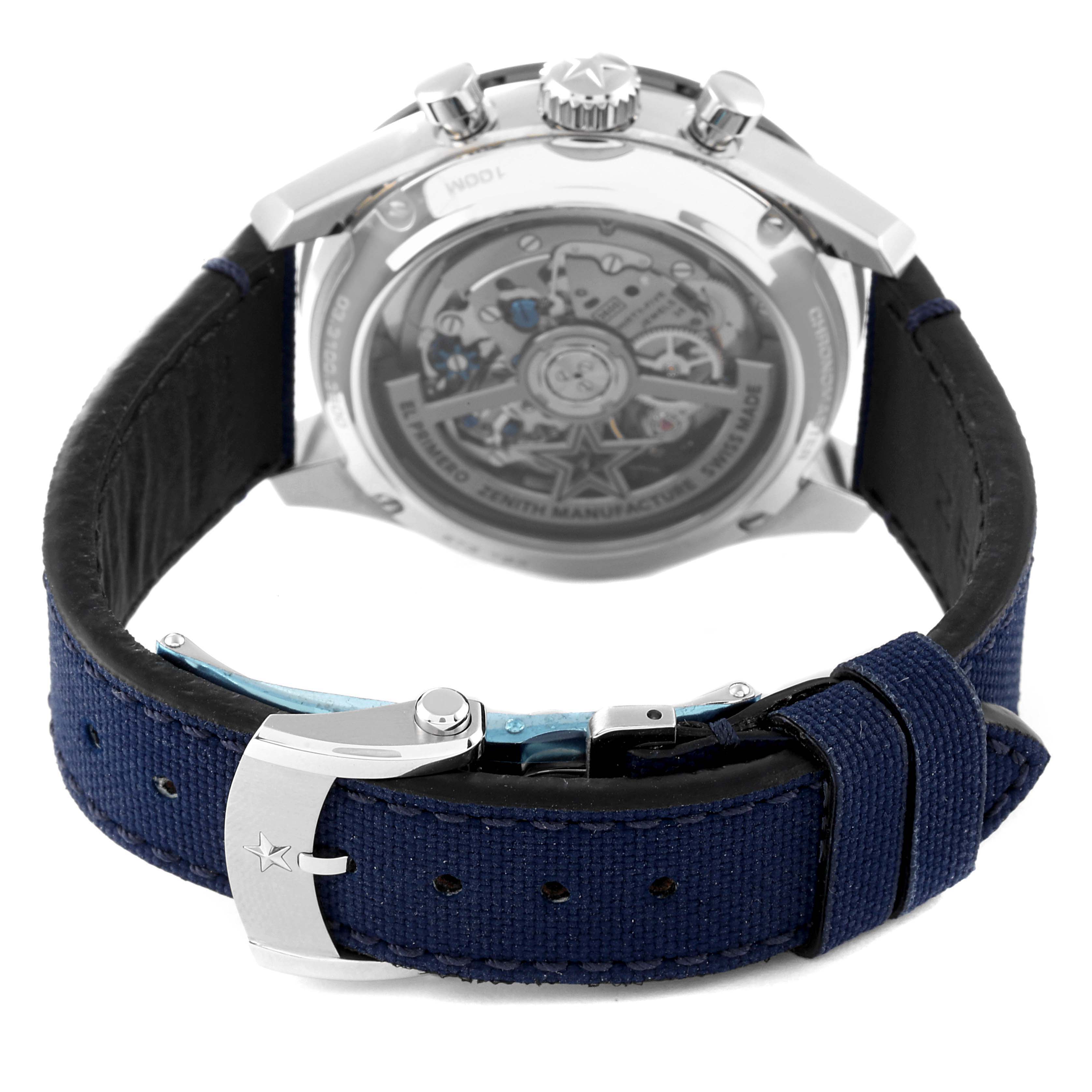 The image shows the back view of the Zenith Chronomaster 03.3100.3600 Men's Stainless Steel White Dial 03.3100.3600 Men's Stainless Steel White Dial watch, highlighting the visible movement and the buckle of the blue strap.