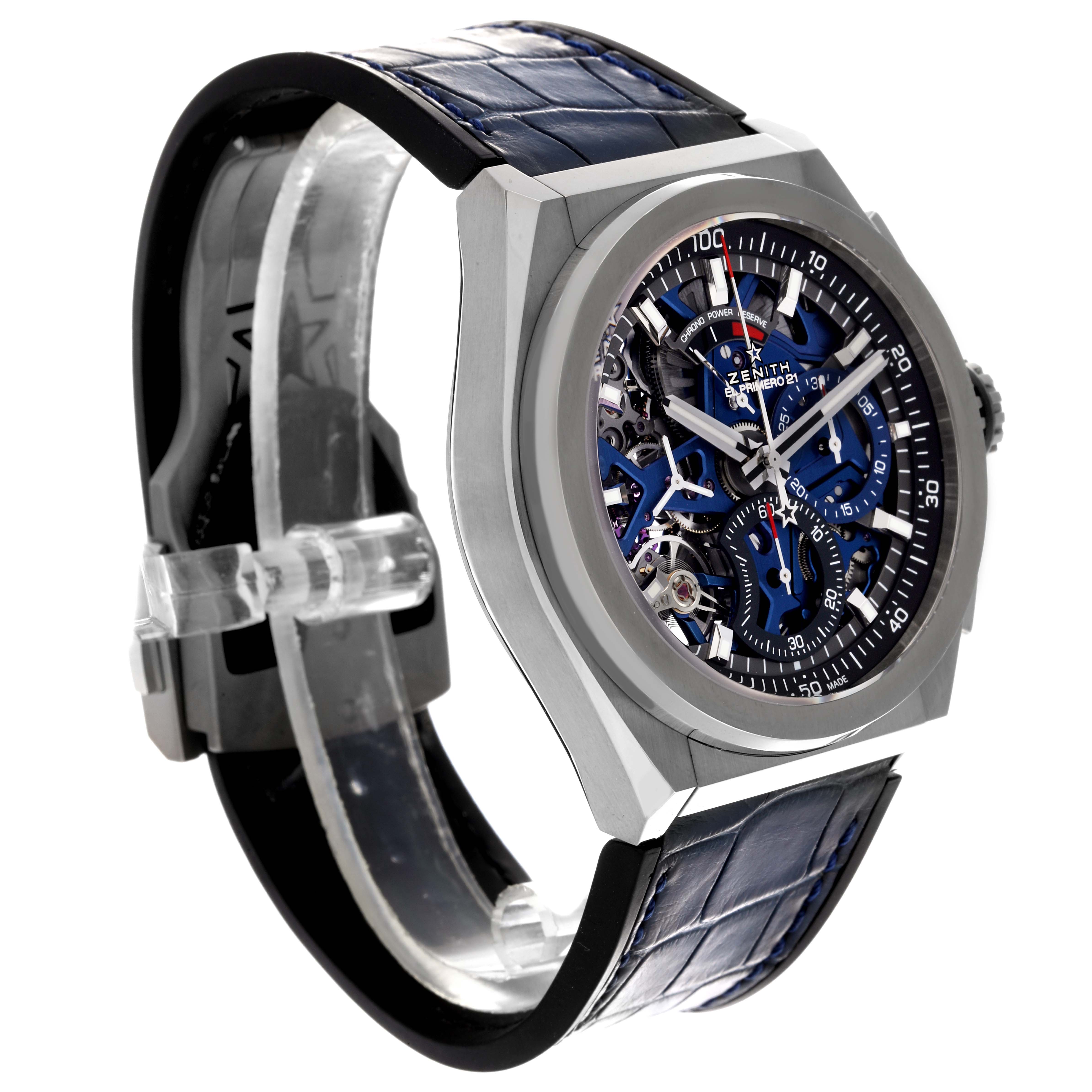 The Zenith El Primero 95.9002.9004/78.R584 Men
s Titanium Blue Dial 95.9002.9004/78.R584 Men
s Titanium Blue Dial watch is shown at a three-quarter angle, highlighting its face, dial, and blue leather strap.