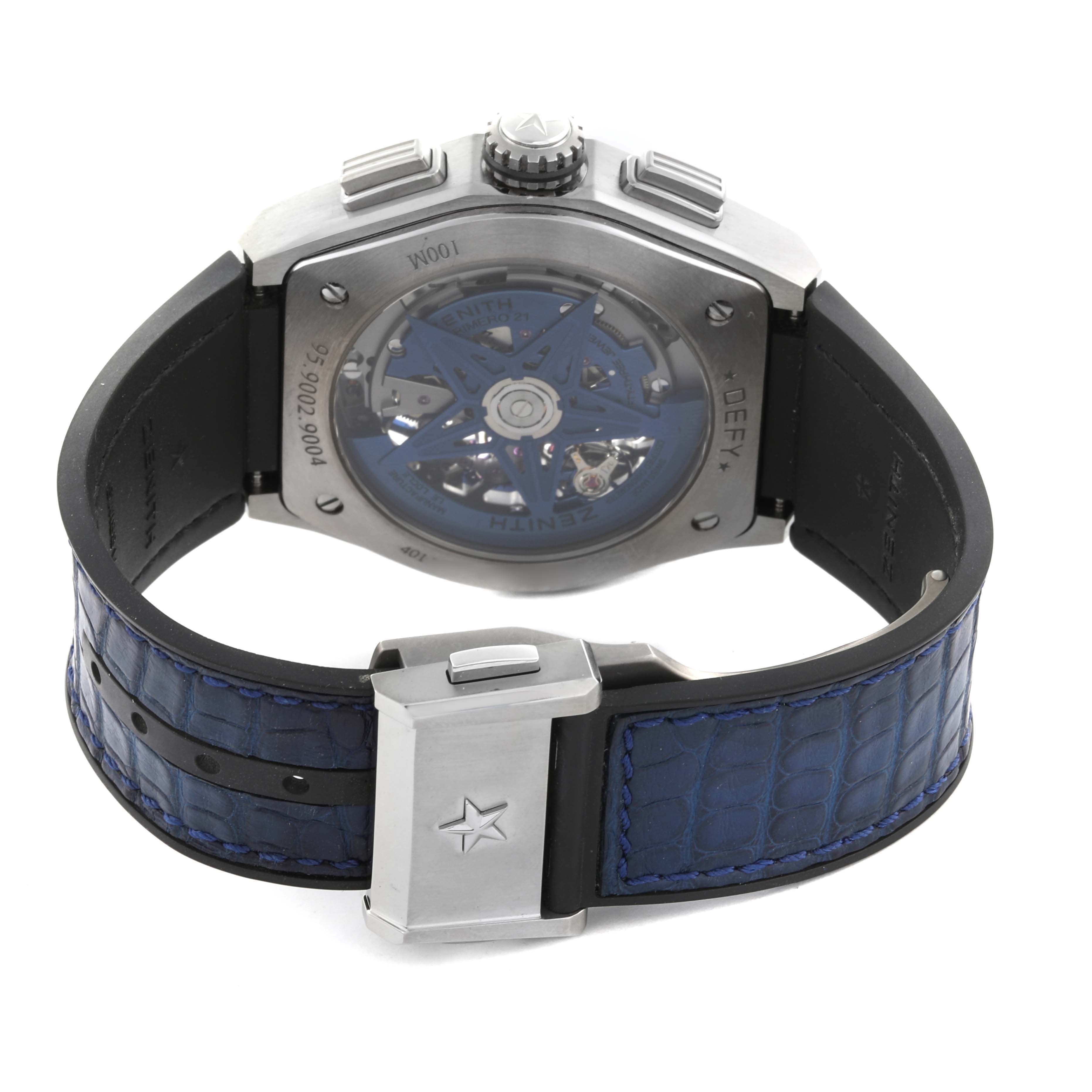 The image shows the back of the Zenith El Primero 95.9002.9004/78.R584 Men
s Titanium Blue Dial 95.9002.9004/78.R584 Men
s Titanium Blue Dial watch, highlighting the movement and blue leather strap.