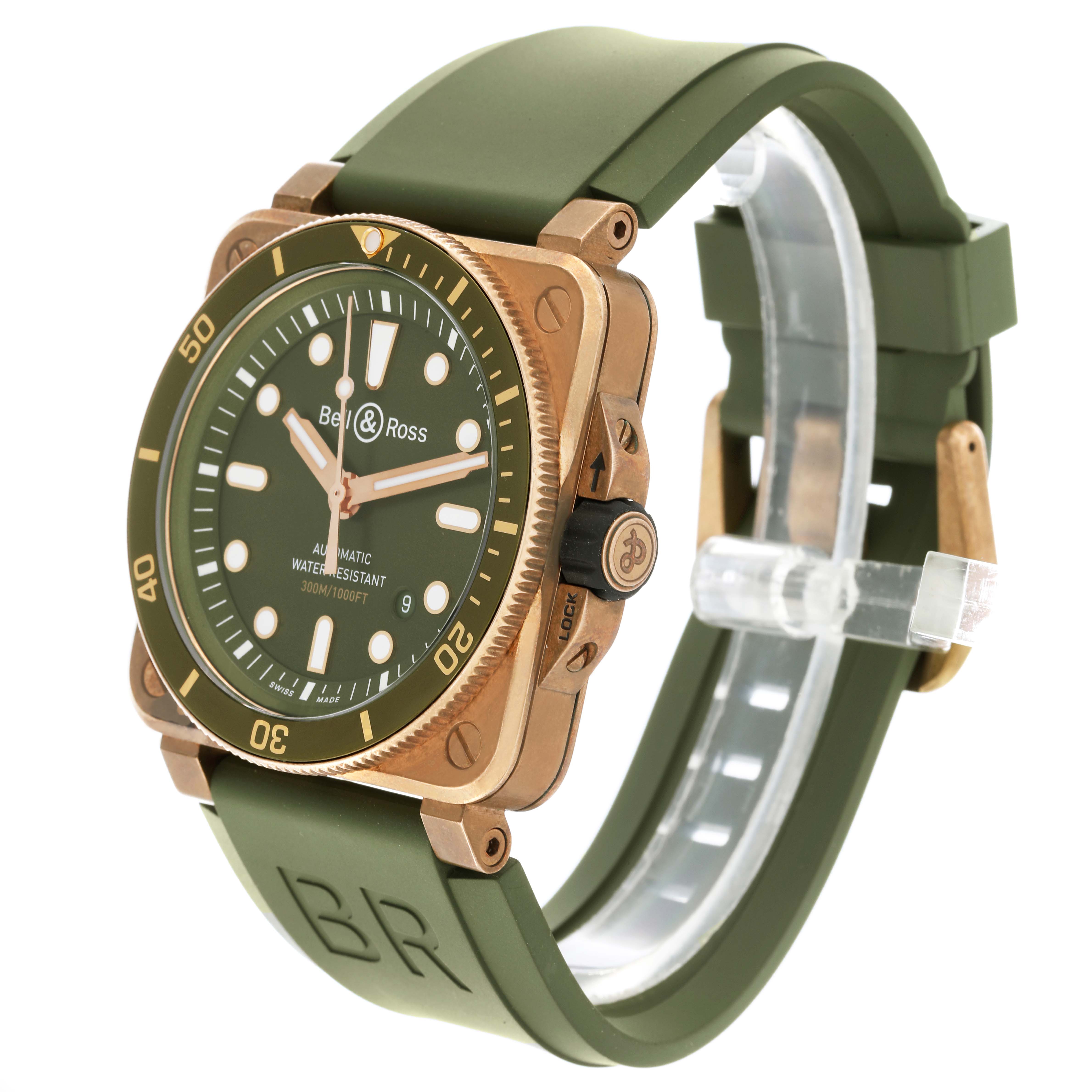 The Bell 
Ross Instruments BR03-92-DIV-B Men
s Bronze Green Dial BR03-92-DIV-B Men
s Bronze Green Dial watch is shown from a side angle, displaying the face, bezel, crown, and green strap.