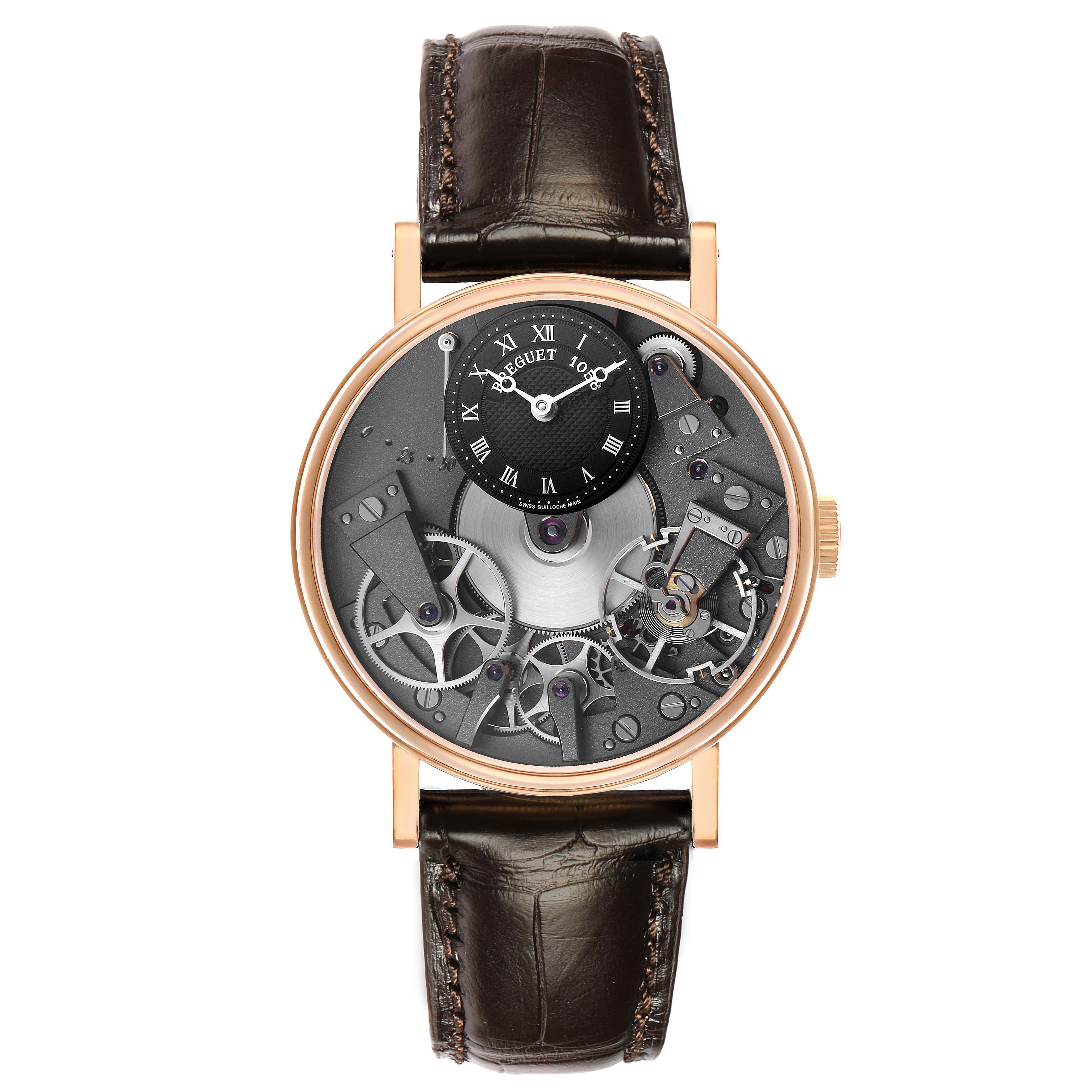 The Breguet Tradition 7027 Men's Rose Gold Grey Dial watch is shown from the front, displaying its dial and visible mechanical components.
