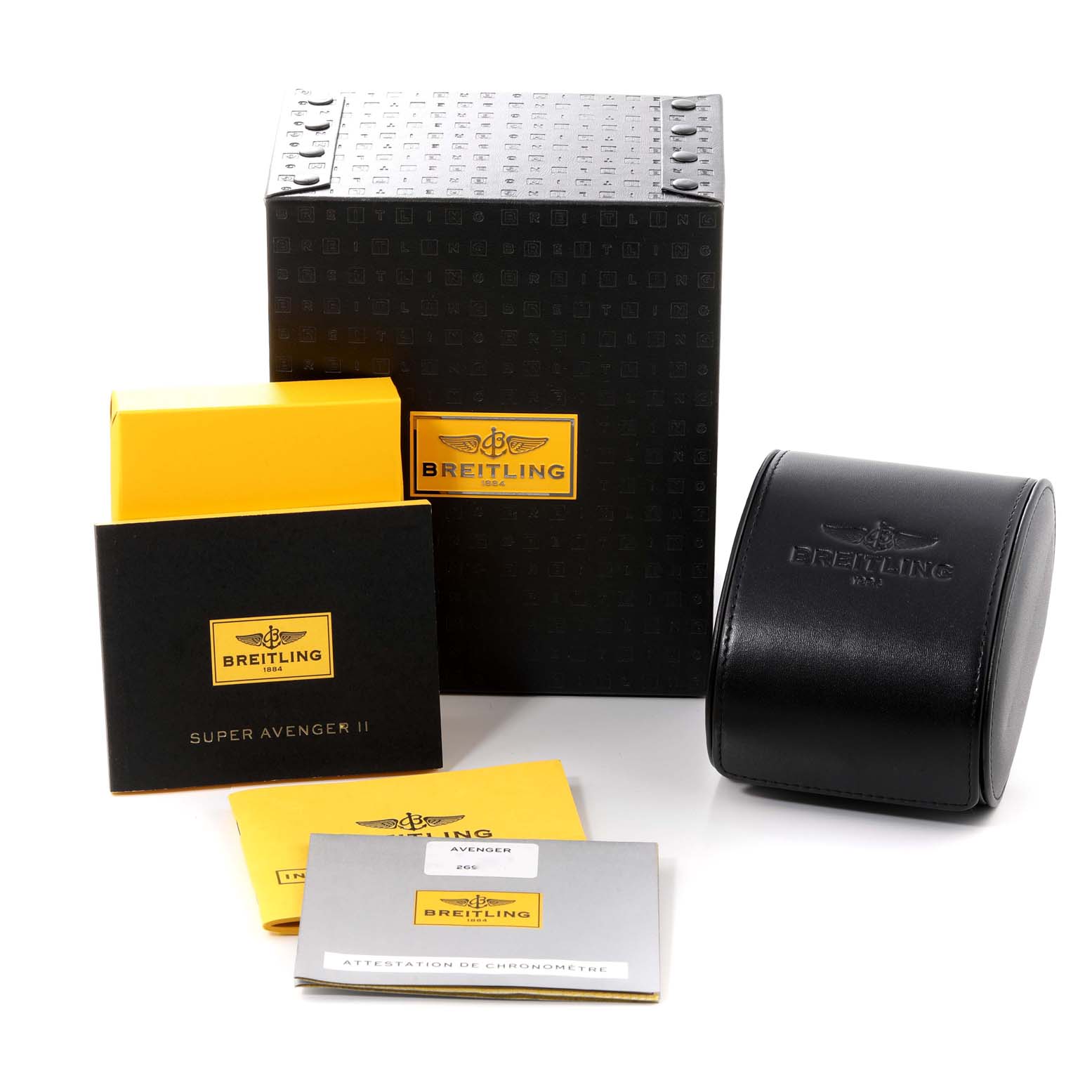The image shows the packaging and accessories for the Breitling Avenger A13371 Men's Stainless Steel Black Dial A13371 Men's Stainless Steel Black Dial watch, including boxes, manuals, and a leather case.