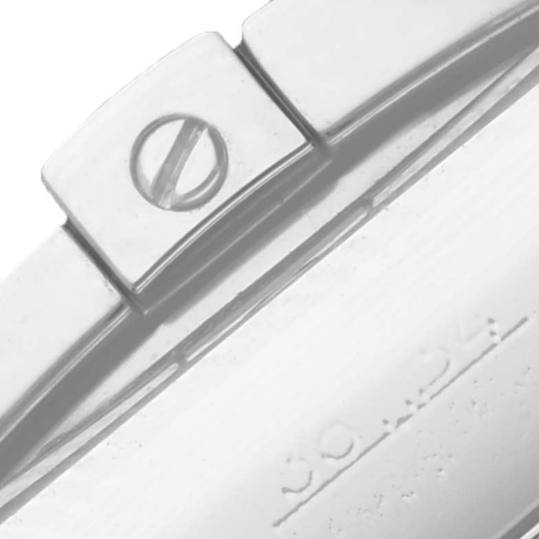 The image shows a close-up of the bezel's screws on a Breitling Chronomat AB0140 Men's Stainless Steel Grey Dial AB0140 Men's Stainless Steel Grey Dial watch.