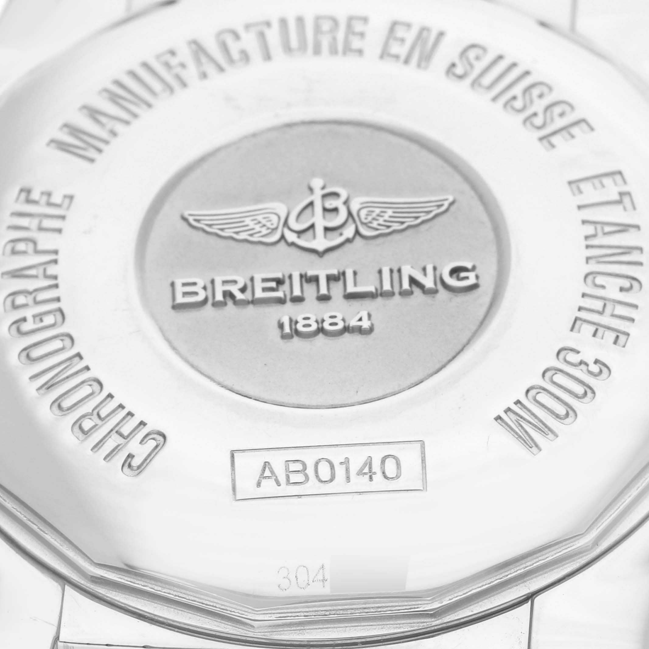 This image shows the case back of a Breitling Chronomat AB0140 Men's Stainless Steel Grey Dial AB0140 Men's Stainless Steel Grey Dial, highlighting the logo and model details.