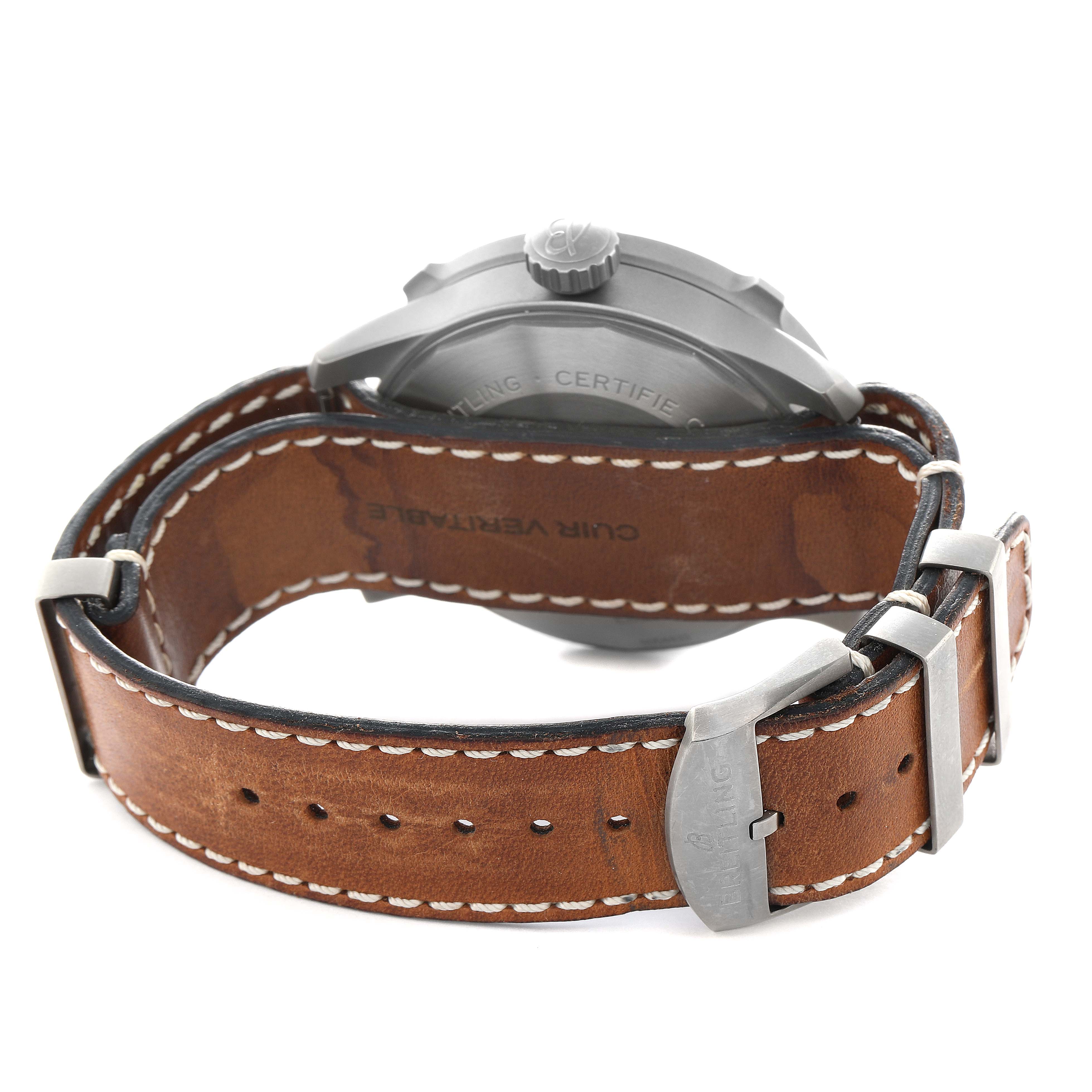 The Breitling Navitimer EB2040101L1X1 Men's Titanium Green Dial watch is shown from the back, highlighting the leather strap and the case back.