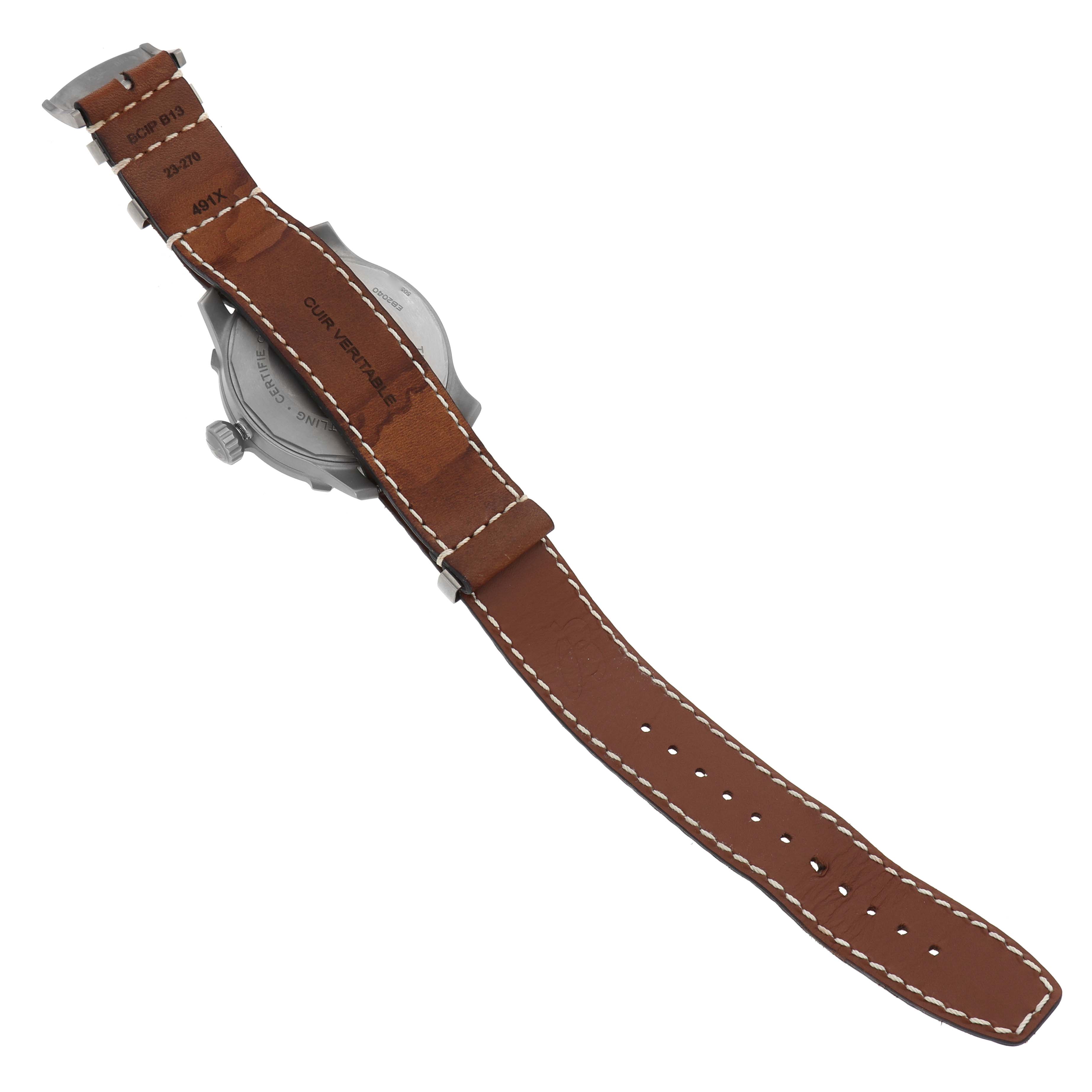 The image shows the back view of a Breitling Navitimer EB2040101L1X1 Men's Titanium Green Dial watch, highlighting the brown leather strap and case back.