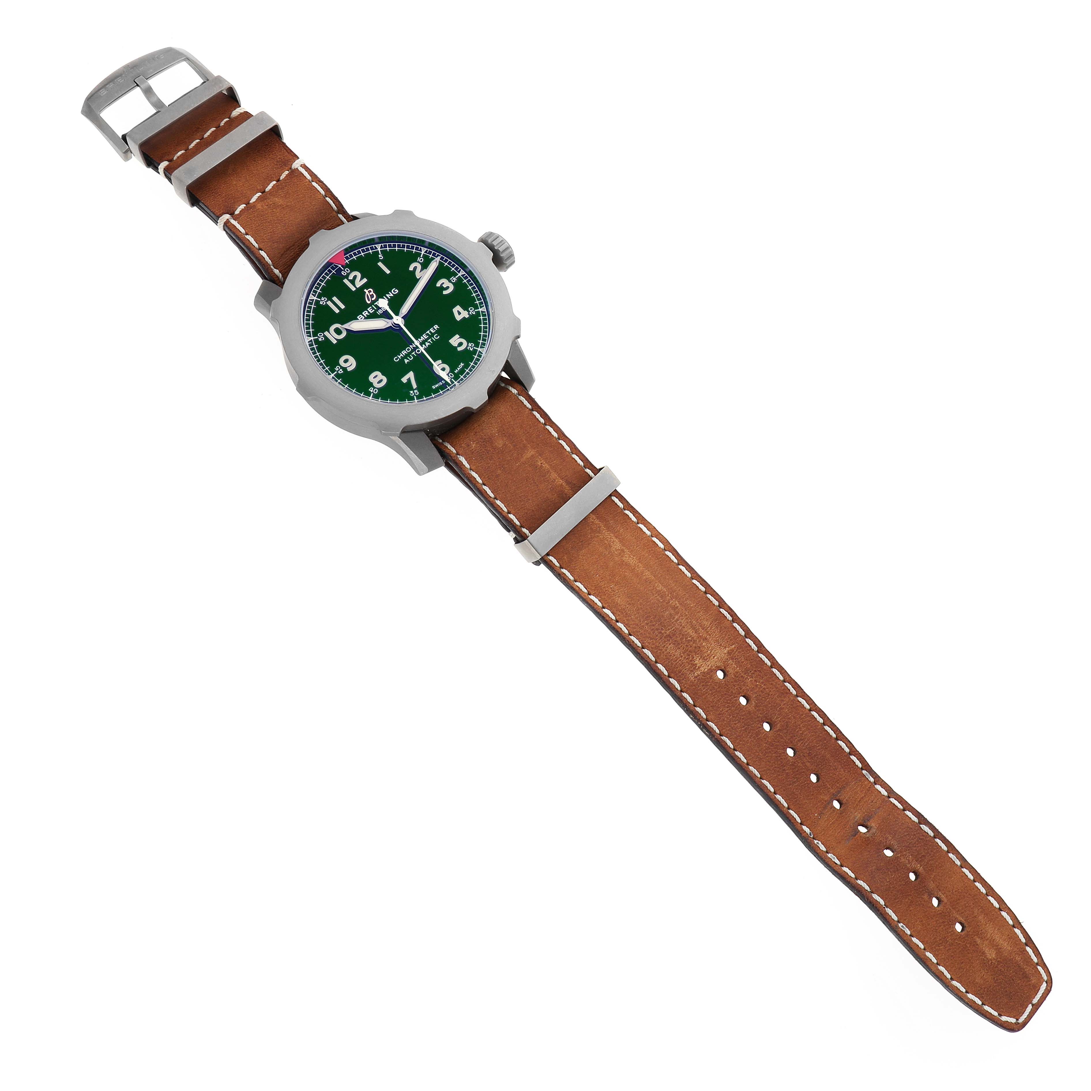 The Breitling Navitimer EB2040101L1X1 Men's Titanium Green Dial watch is shown at a slight angle highlighting the green dial, brown leather strap, and buckle.