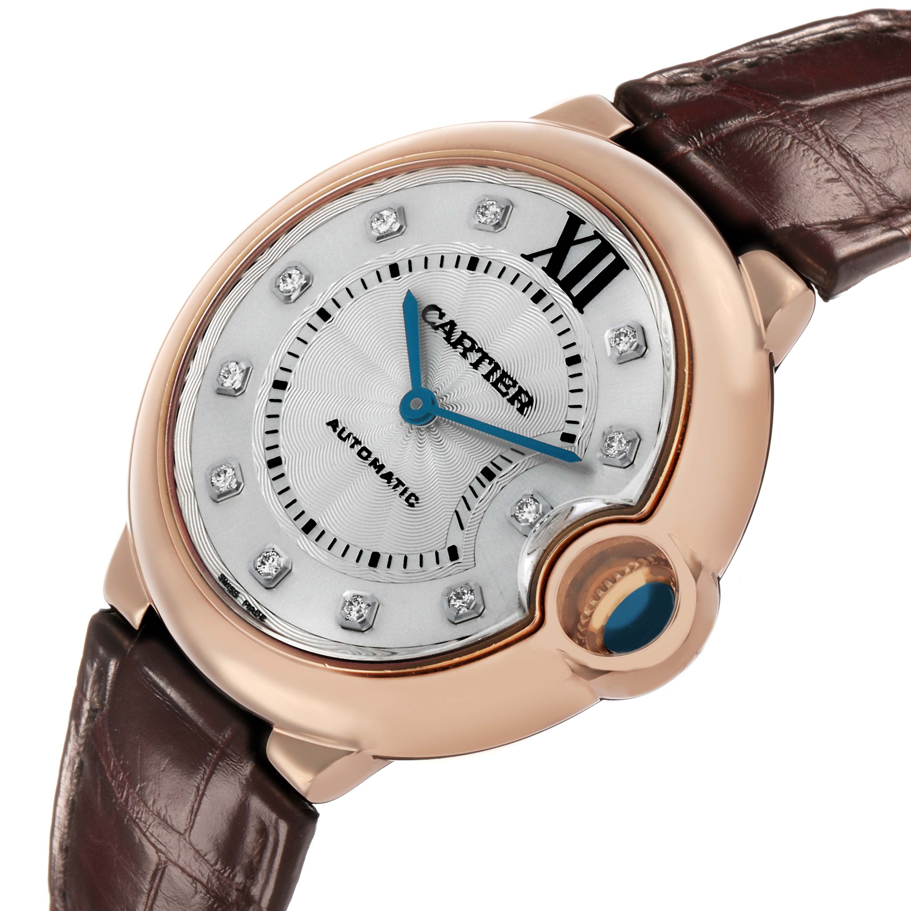 The Cartier Ballon Bleu WJBB0010 Women's Rose Gold Silver Dial watch is shown at a slight angle, highlighting the dial, crown, and part of the leather strap.