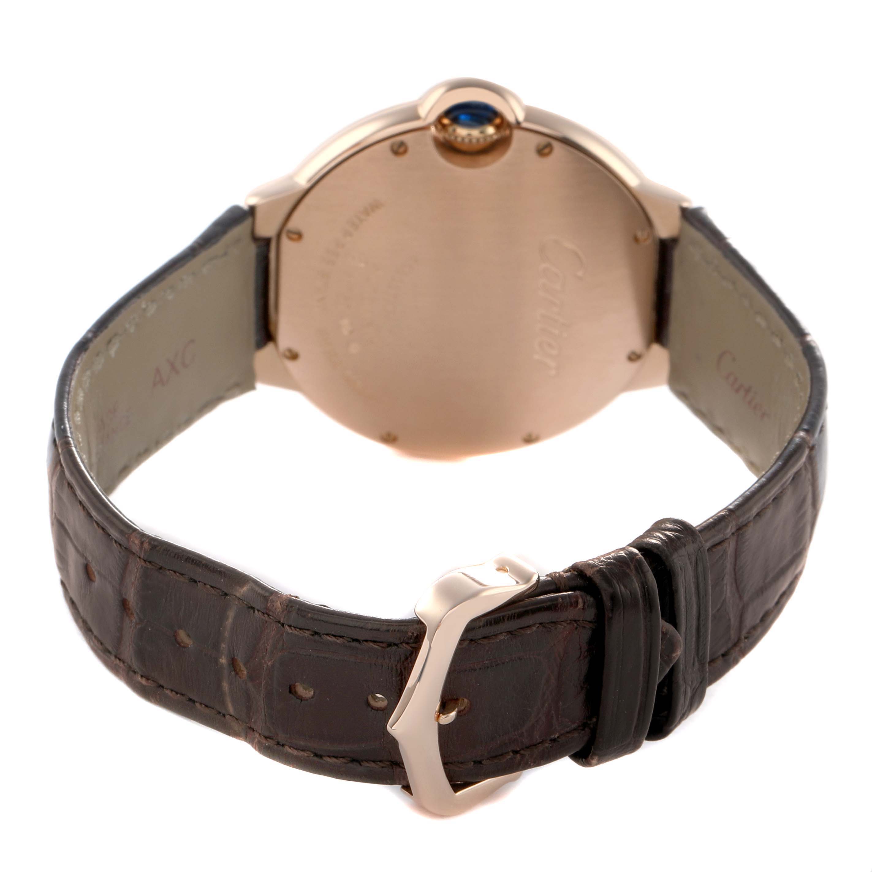 The Cartier Ballon Bleu WJBB0010 Women's Rose Gold Silver Dial watch is shown from the back, highlighting the clasp, leather strap, and case back.