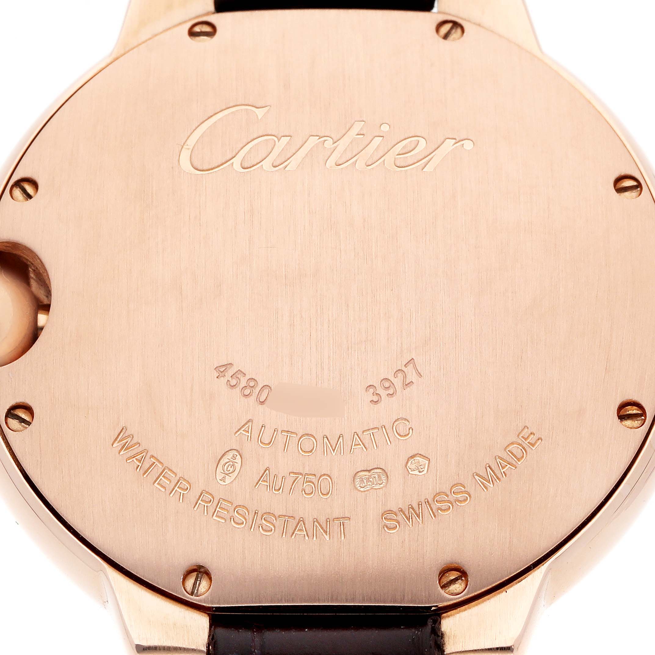 The Cartier Ballon Bleu WJBB0010 Women's Rose Gold Silver Dial watch is shown from the back, highlighting the brand engraving and technical details.