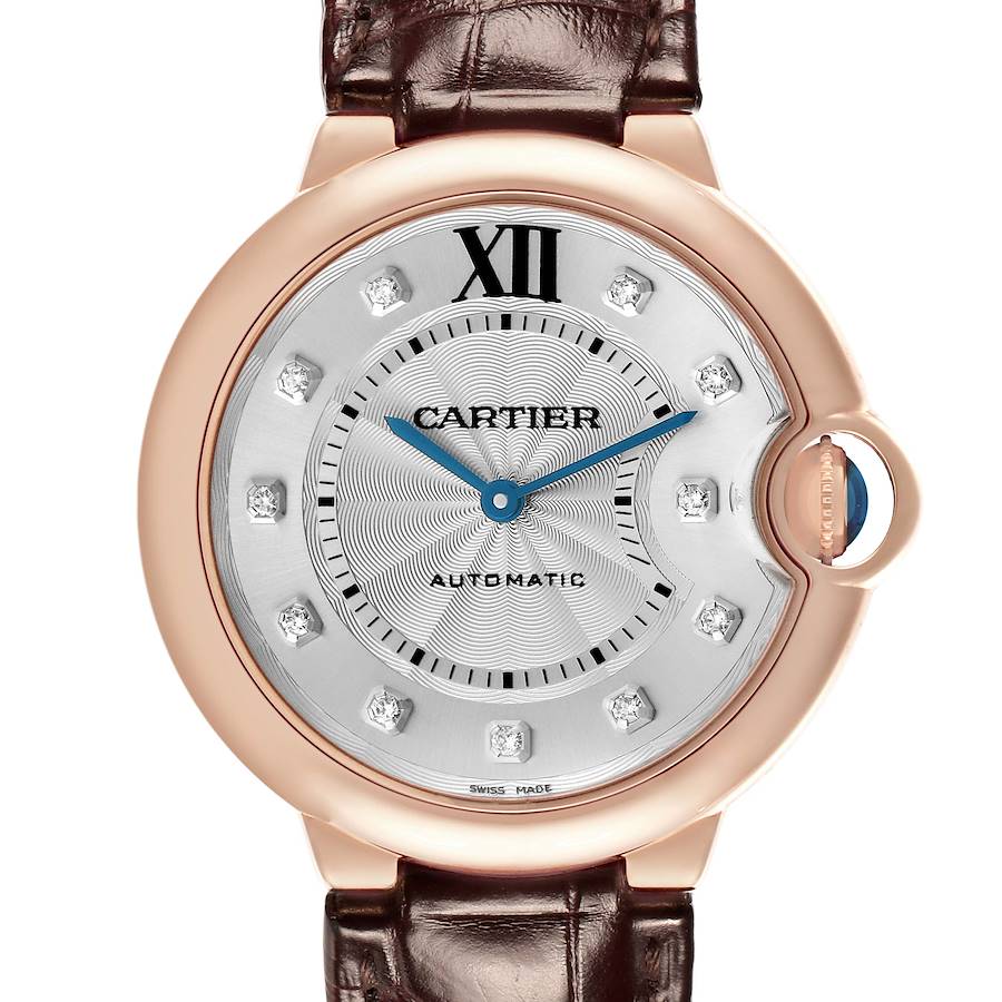 The Cartier Ballon Bleu WJBB0010 Women's Rose Gold Silver Dial watch is shown from the front, highlighting its dial, blue hands, and the distinctive crown.