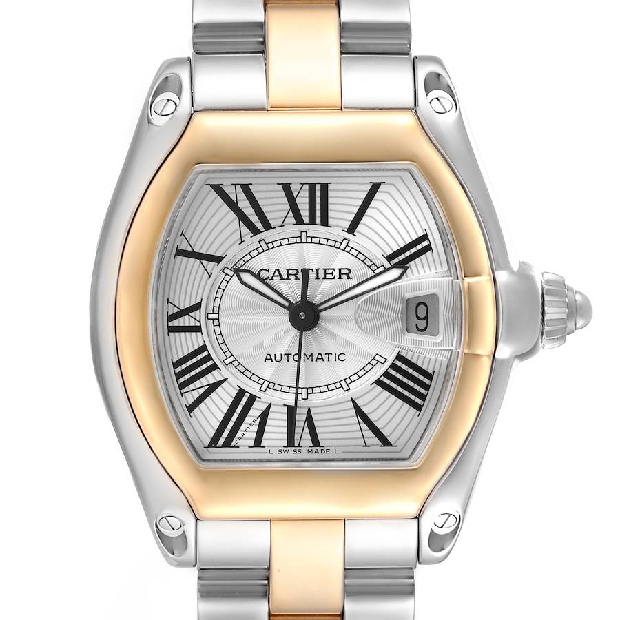 The Cartier Roadster watch is shown from a front angle, displaying the face, bezel, crown, and part of the bracelet.