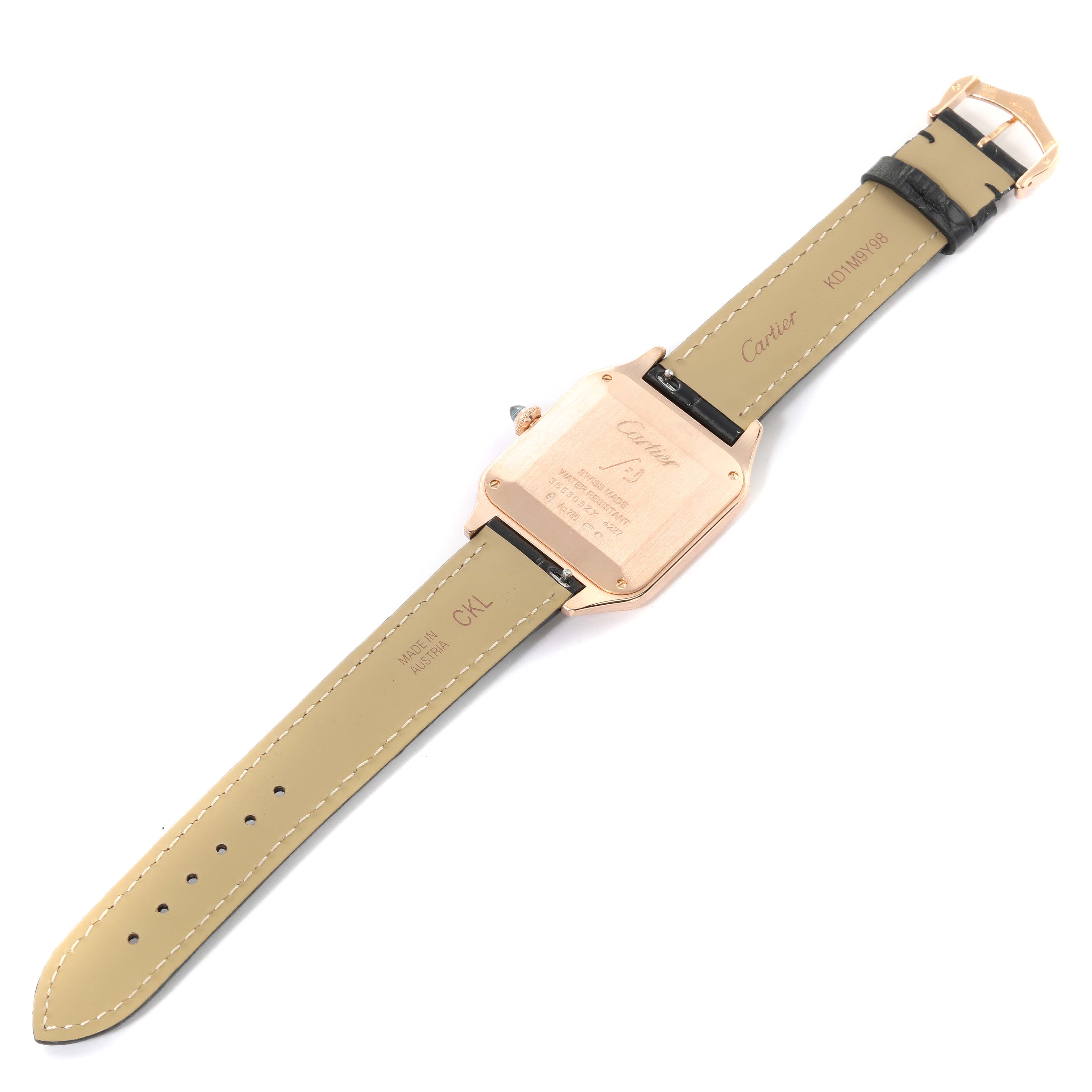 The image shows the back and strap of a Cartier Santos Dumont WGSA0021 Men's Rose Gold Silver Dial WGSA0021 Men's Rose Gold Silver Dial watch, taken from a top-down angle.