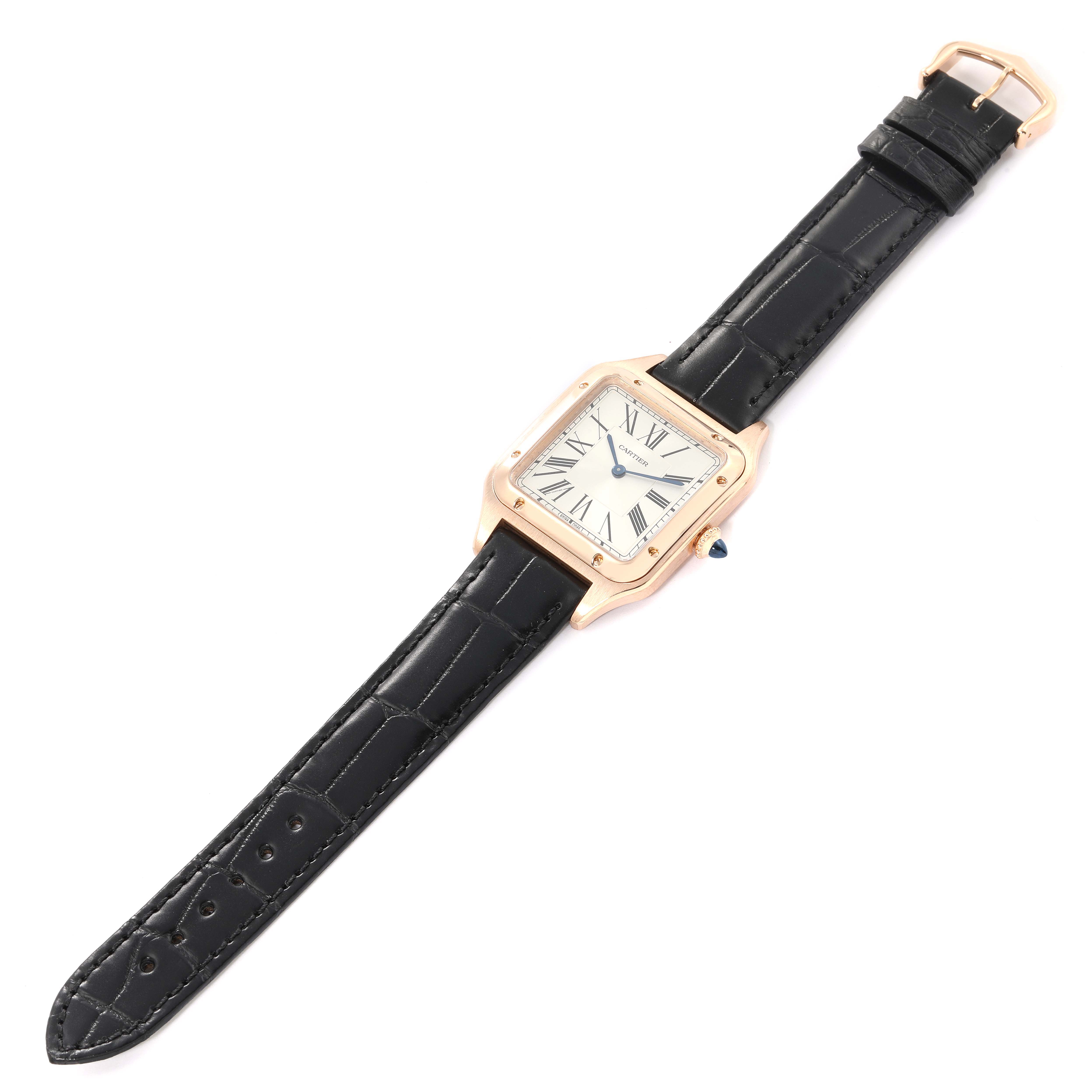 This image shows the Cartier Santos Dumont WGSA0021 Men's Rose Gold Silver Dial WGSA0021 Men's Rose Gold Silver Dial watch from a top-down angle, featuring the entire case, dial, and strap.
