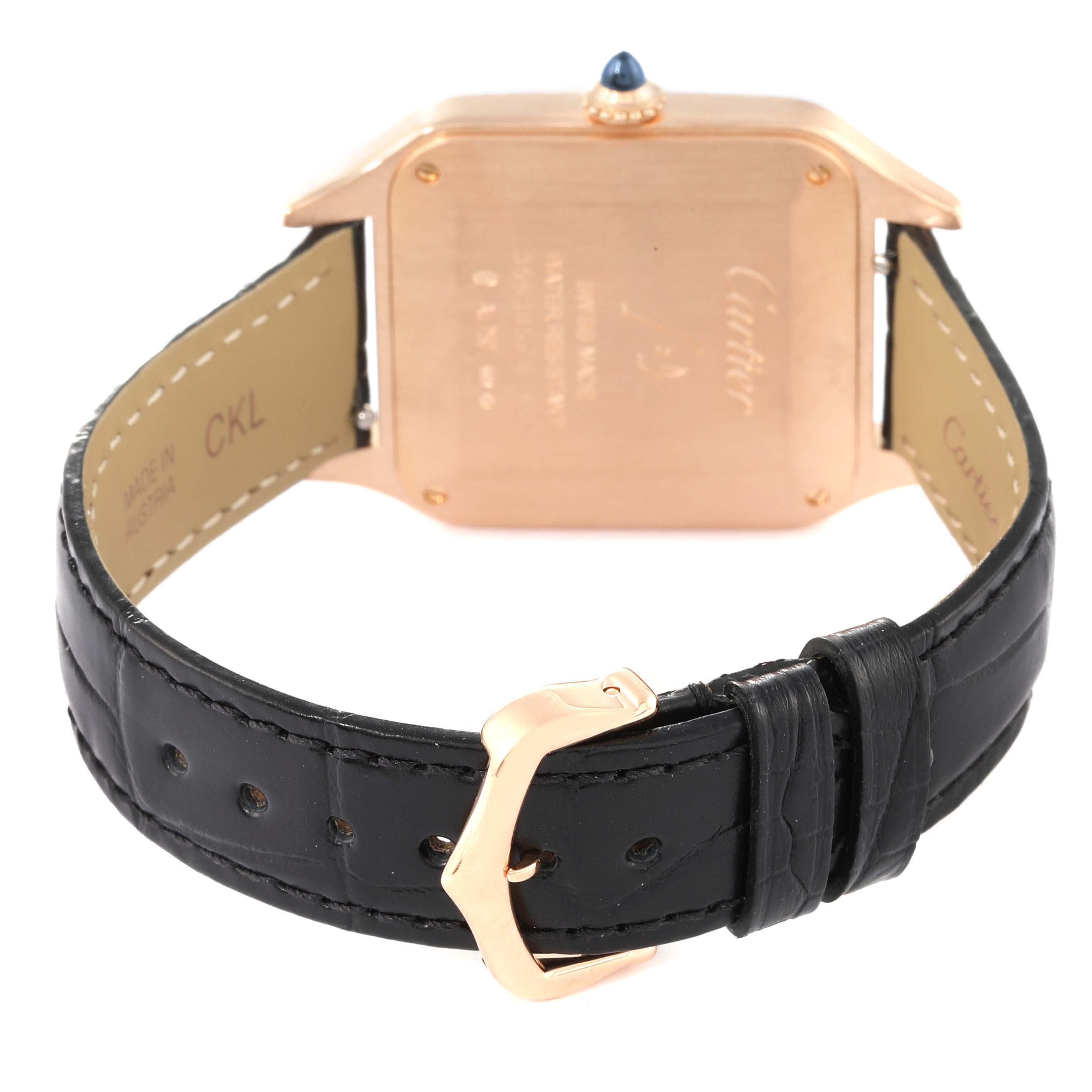 The image shows the back and strap of a Cartier Santos Dumont WGSA0021 Men's Rose Gold Silver Dial WGSA0021 Men's Rose Gold Silver Dial watch, focusing on the case back and leather strap with the buckle.