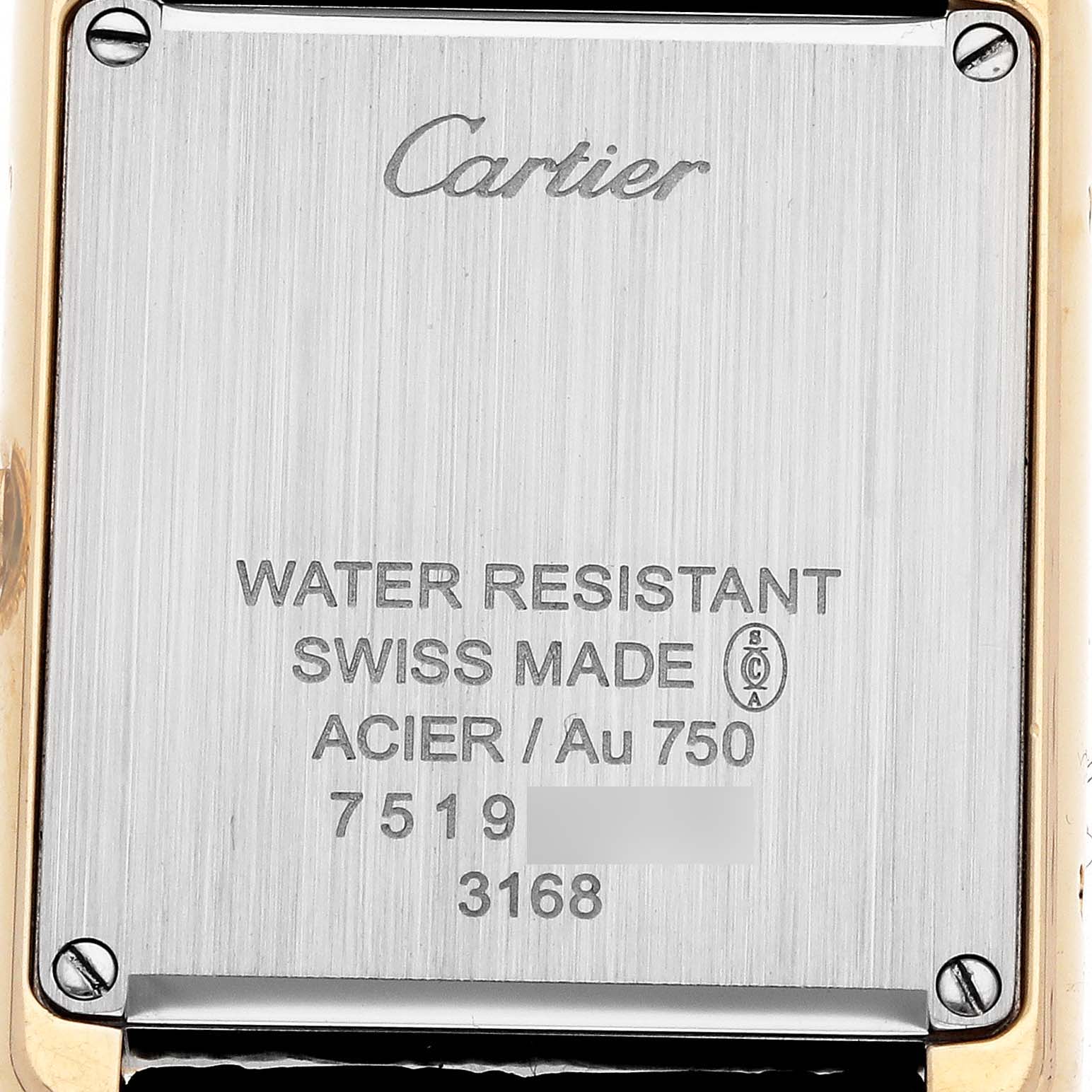 The image shows the back case of a Cartier Tank Solo W5200002 Women's Yellow Gold Silver Dial watch, displaying brand, material, and water resistance details.
