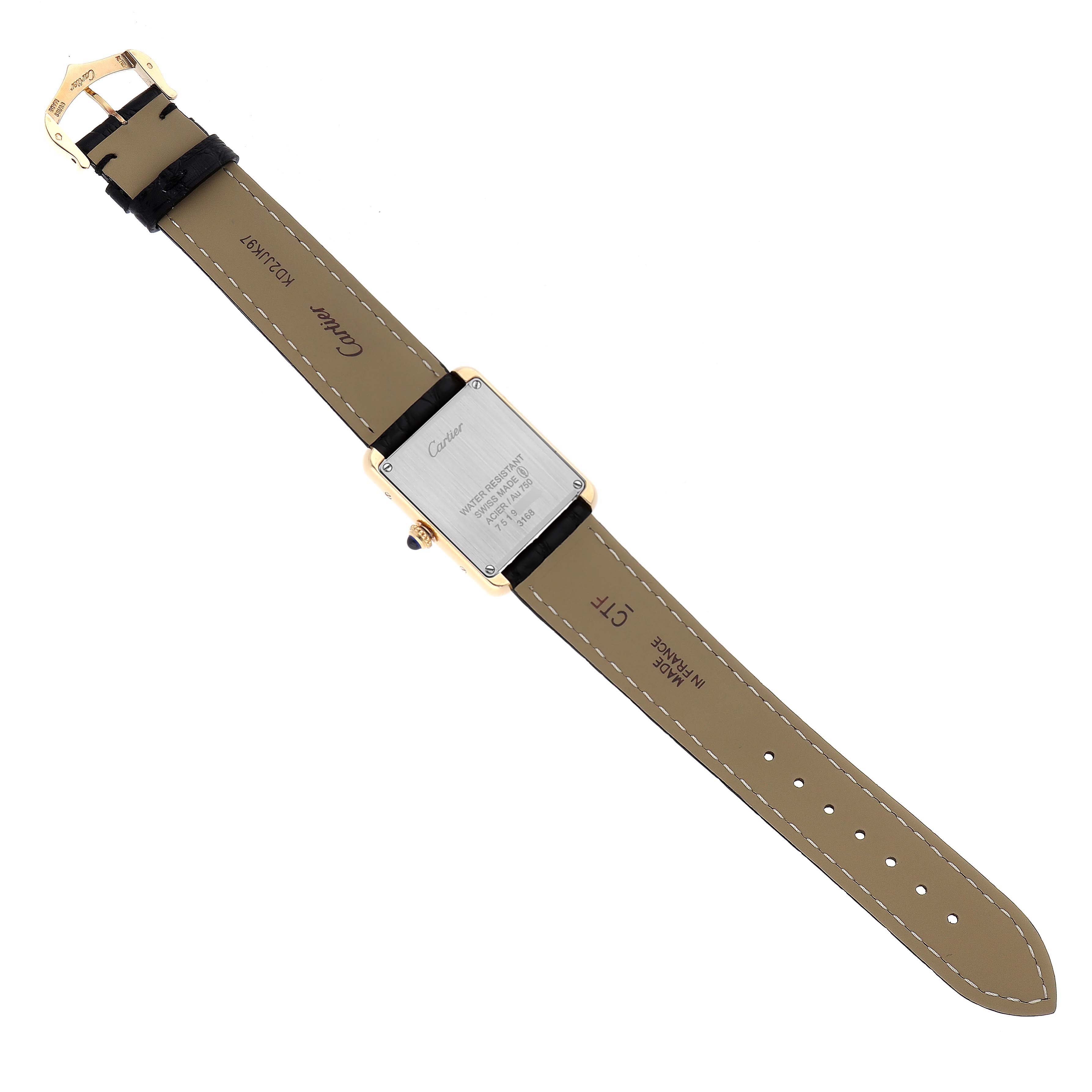 The image shows the back of the Cartier Tank Solo W5200002 Women's Yellow Gold Silver Dial watch, highlighting the case back, strap, and buckle.