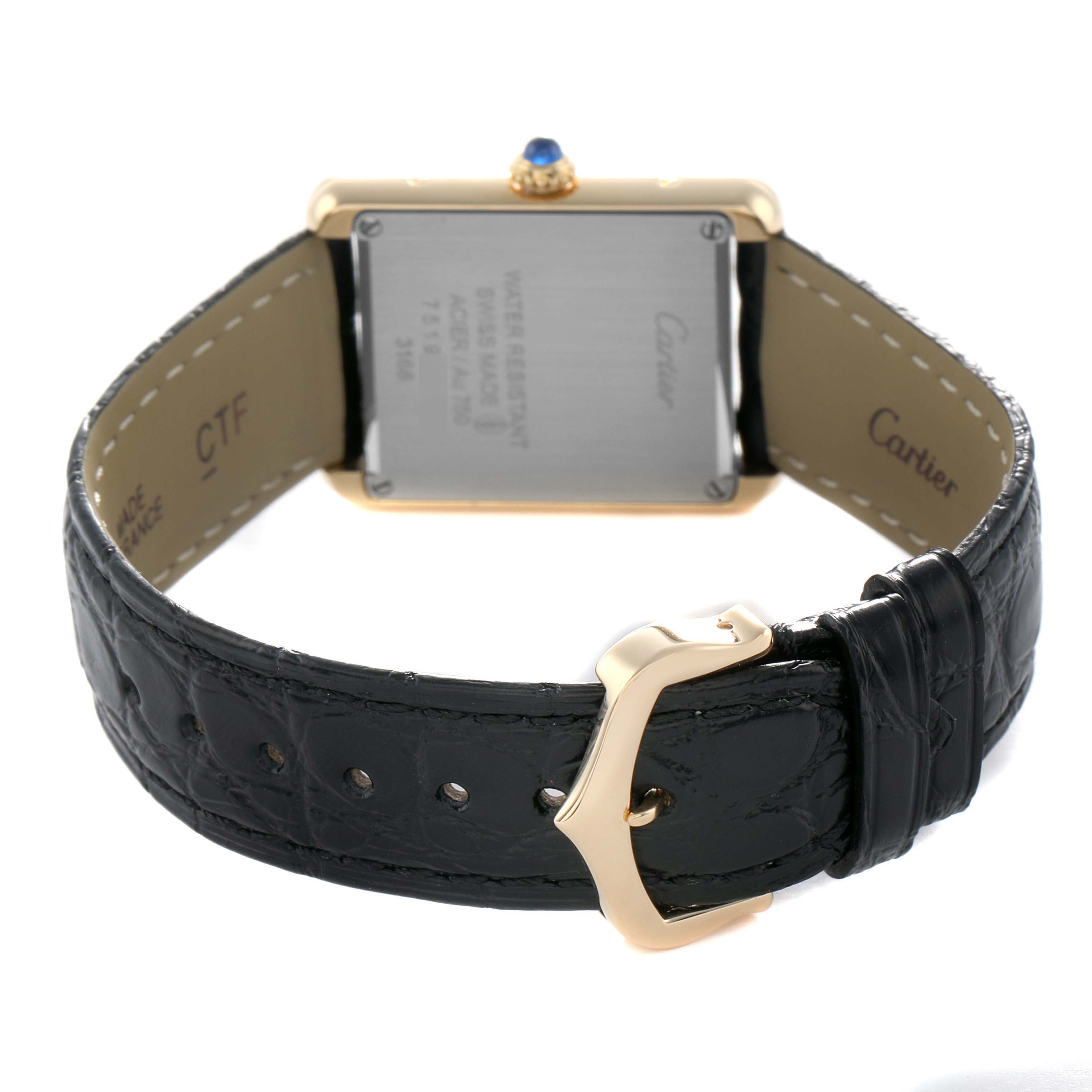 The Cartier Tank Solo W5200002 Women's Yellow Gold Silver Dial watch is shown from the back, highlighting the case, strap, buckle, and crown.