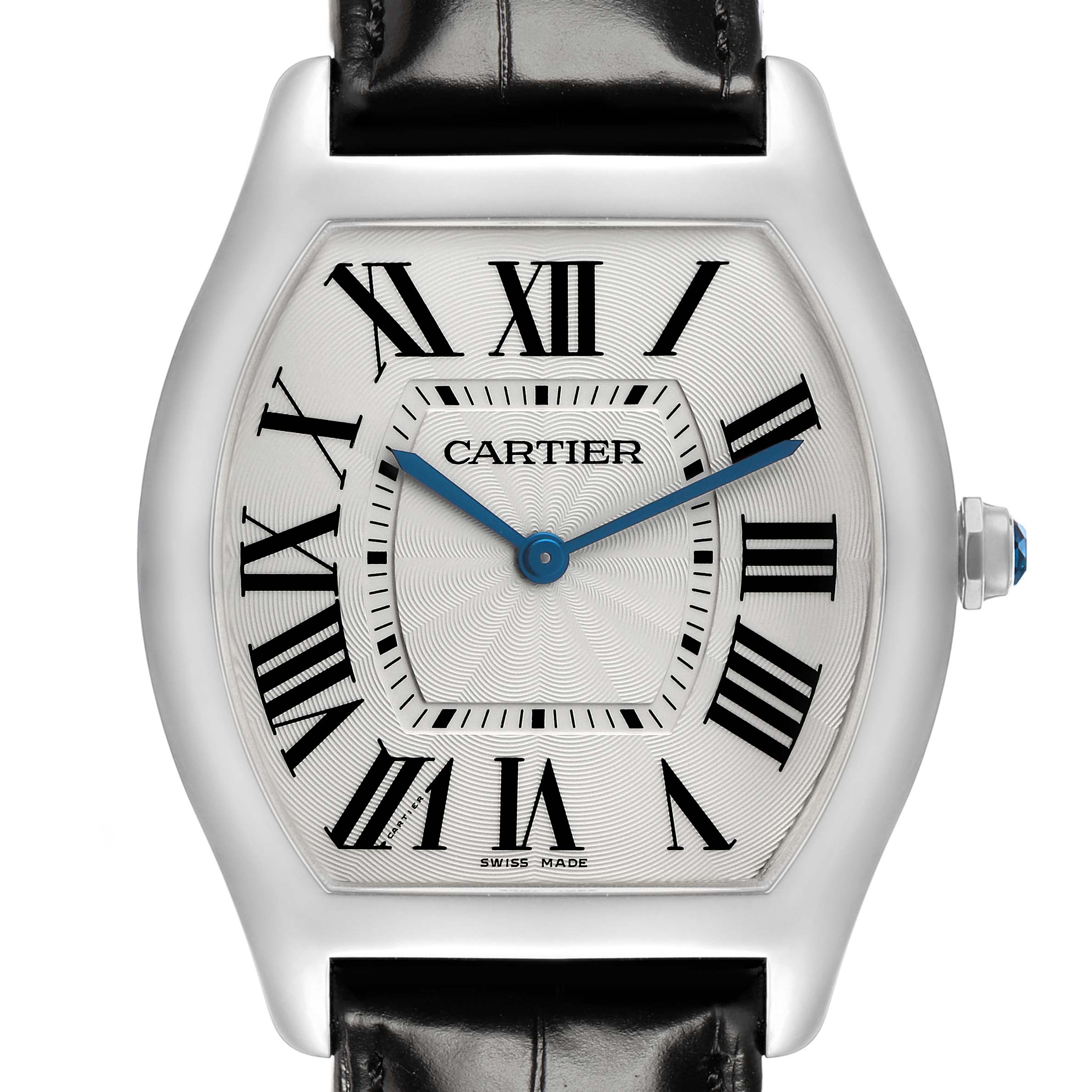 The Cartier Tortue WGTO0003 Men's White Gold Silver Dial watch is shown from a front angle, displaying its dial, Roman numerals, blue hands, and leather strap.