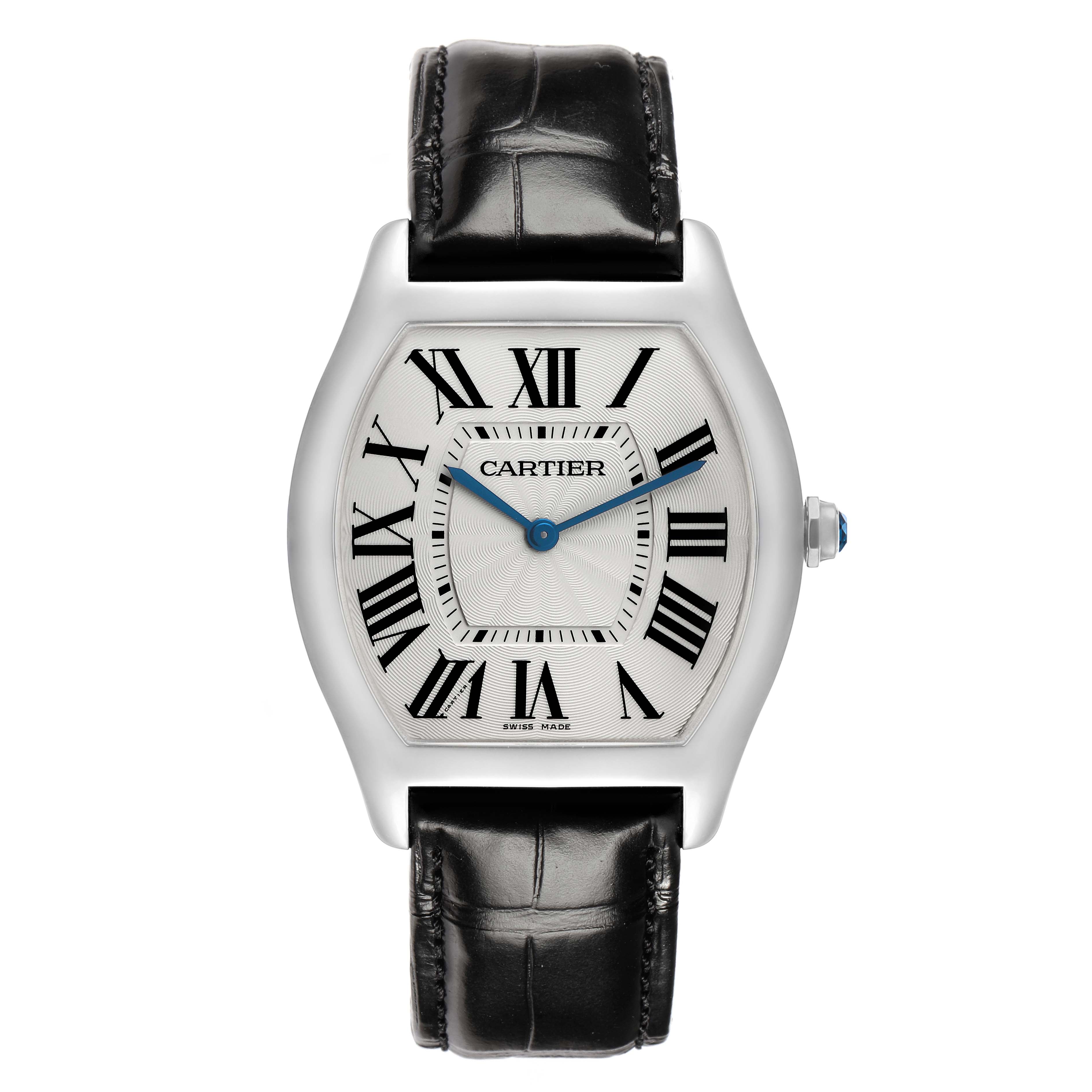 The Cartier Tortue WGTO0003 Men's White Gold Silver Dial watch is shown from a top view, highlighting its face, Roman numerals, blue hands, and a black leather strap.