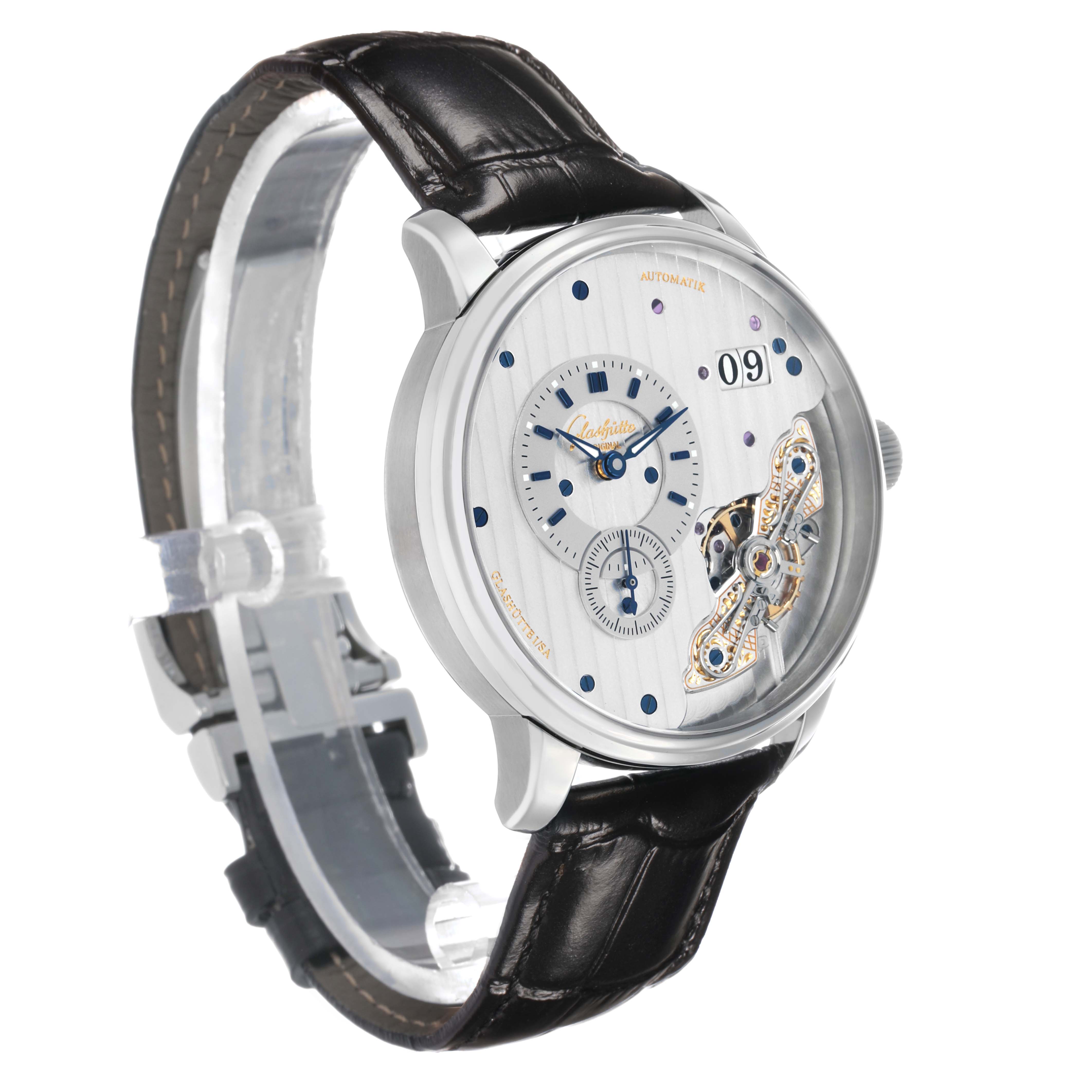 The Glashütte Pano model is shown at a three-quarter angle, displaying the dial, subdials, open heart, and part of the leather strap.