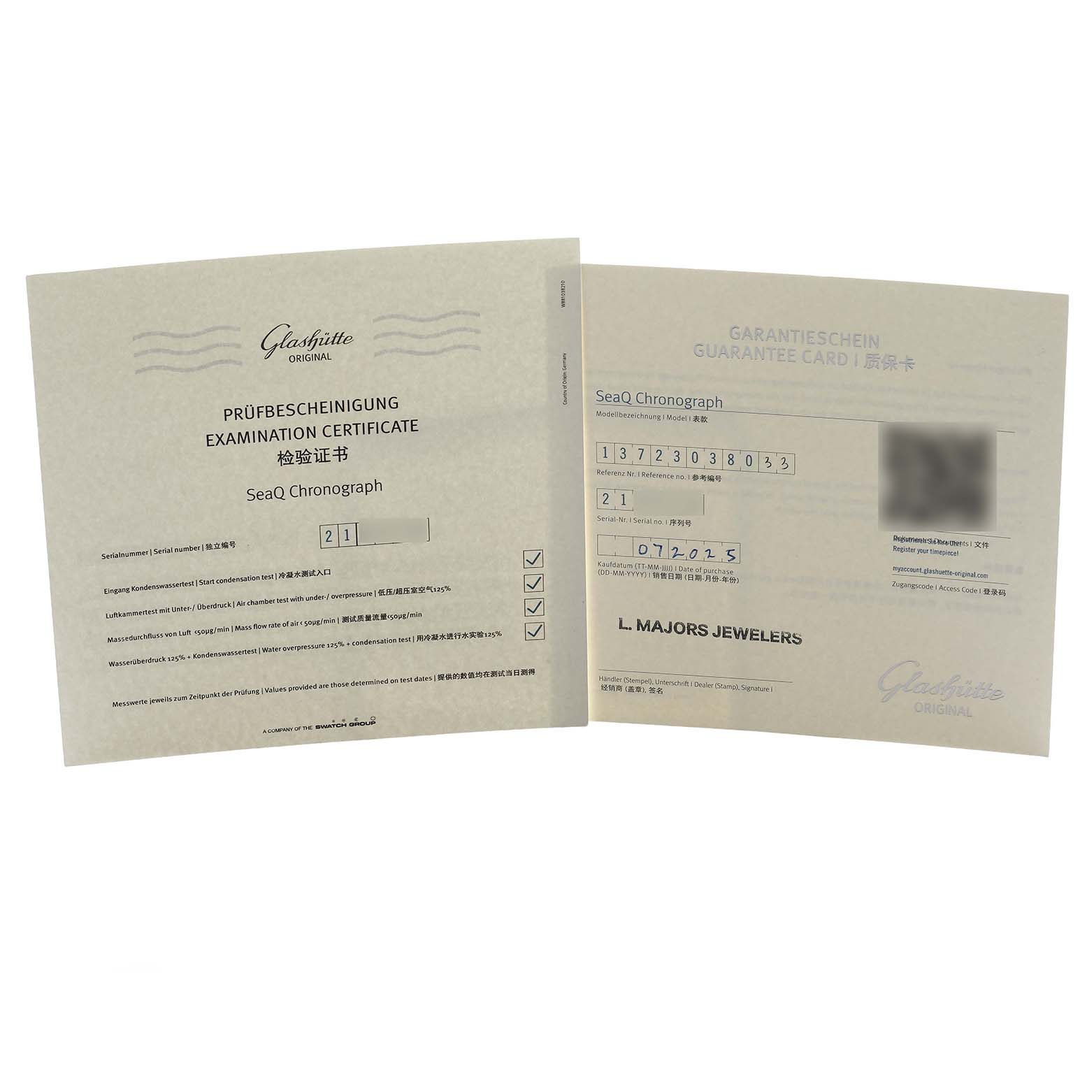 The image shows the Examination Certificate and Guarantee Card for the Glashütte Original SeaQ Chronograph, open and angled slightly upward.