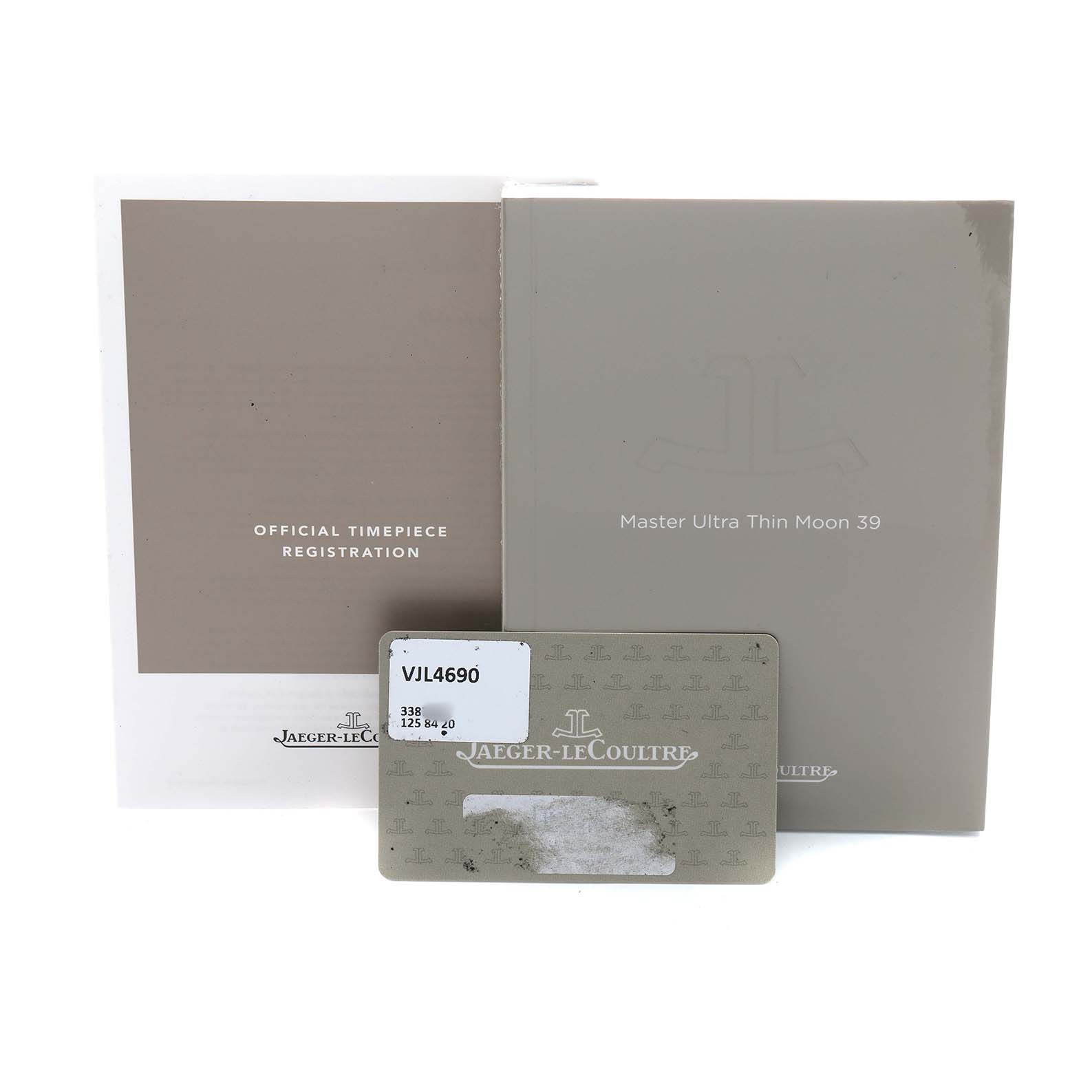 The image shows the manuals and an authenticity card for the Jaeger-LeCoultre Master Ultra Thin Moon 39.