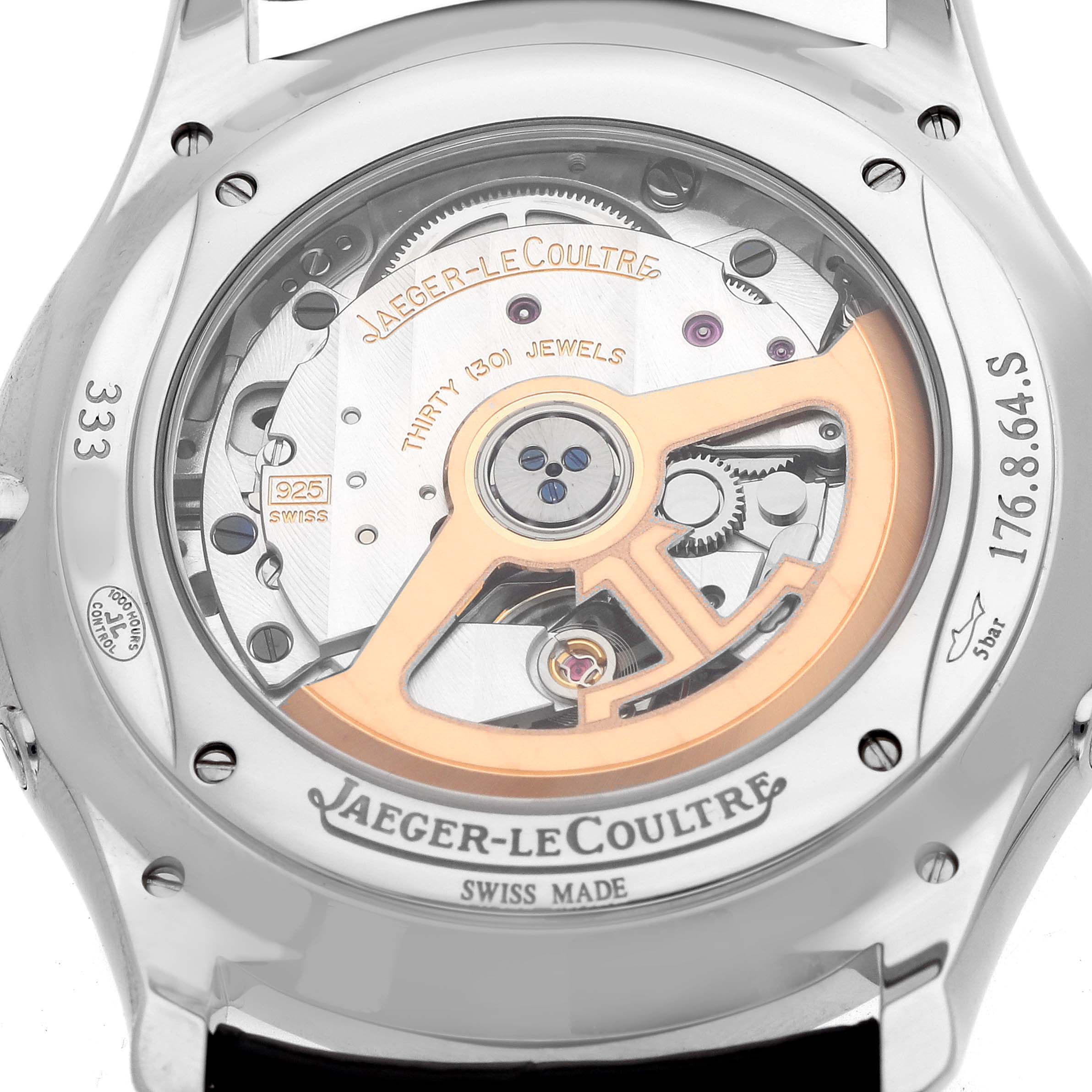 The Jaeger-LeCoultre Master model is shown from the back, displaying its movement and rotor through the sapphire case back.