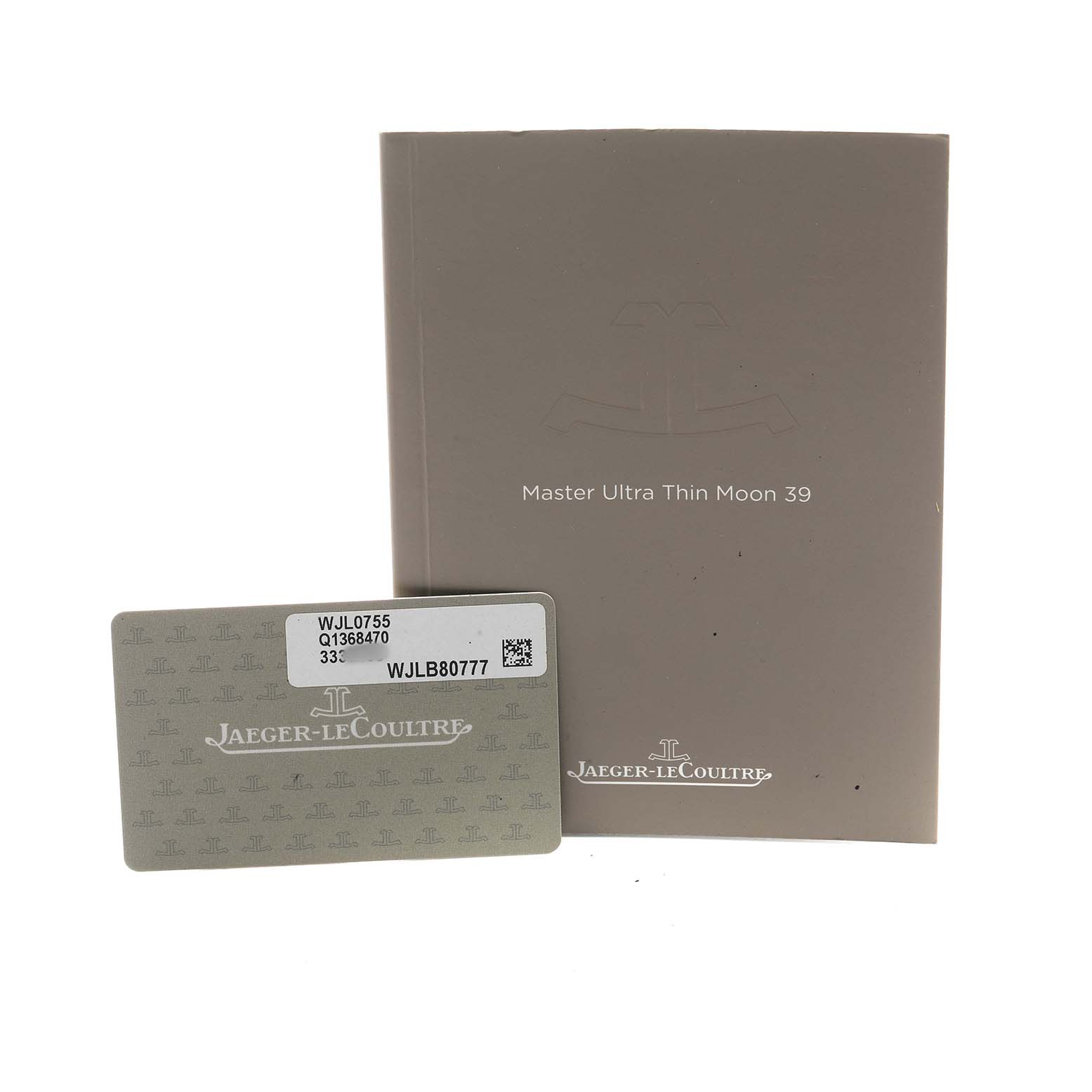 The image shows the instruction manual and warranty card for the Jaeger-LeCoultre Master Ultra Thin Moon 39 watch.