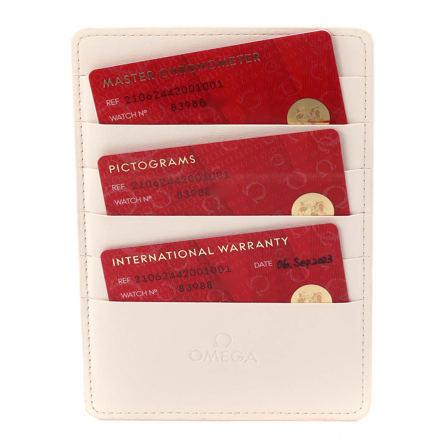 The image shows Omega Seamaster 210.62.44.20.01.001 Men's Ceramic Grey Dial 210.62.44.20.01.001 Men's Ceramic Grey Dial model cards, including warranty and pictogram cards, in their holder.