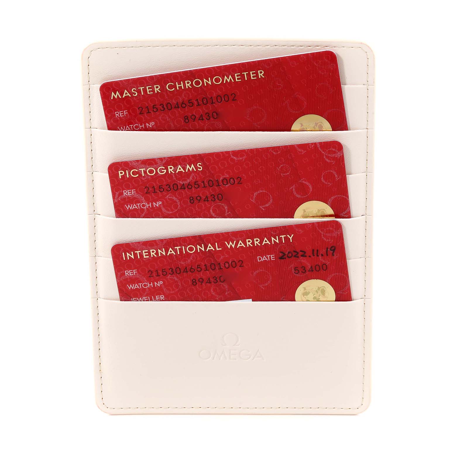 The image shows three red cards related to the Omega Planet Ocean 215.30.46.51.01.002 Men
s Stainless Steel Black Dial 215.30.46.51.01.002 Men
s Stainless Steel Black Dial model, including a Master Chronometer, Pictograms, and International Warranty card.