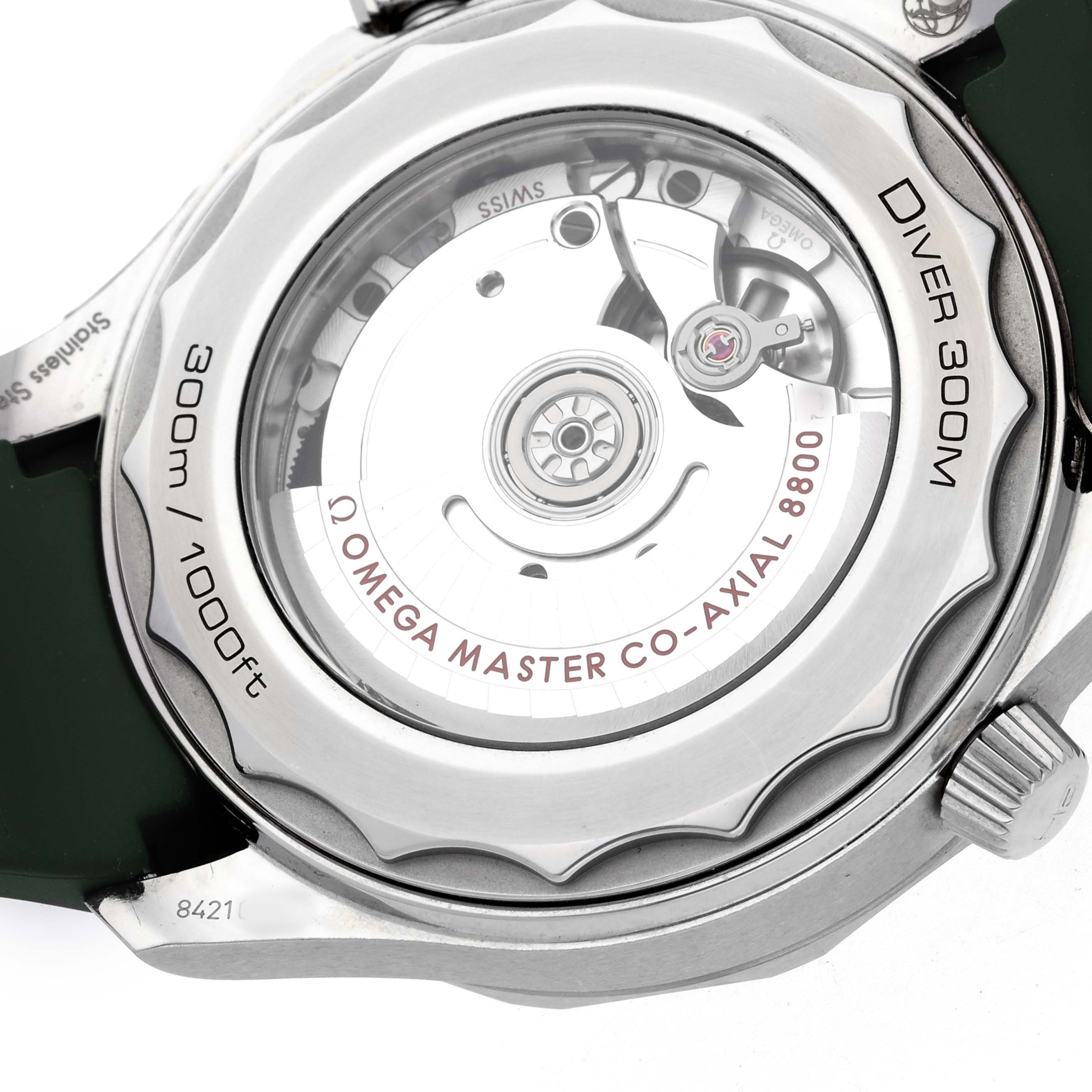 The image shows the case back of an Omega Seamaster 210.30.42.20.10.001 Men's Stainless Steel Green Dial, highlighting its movement and case specifications.