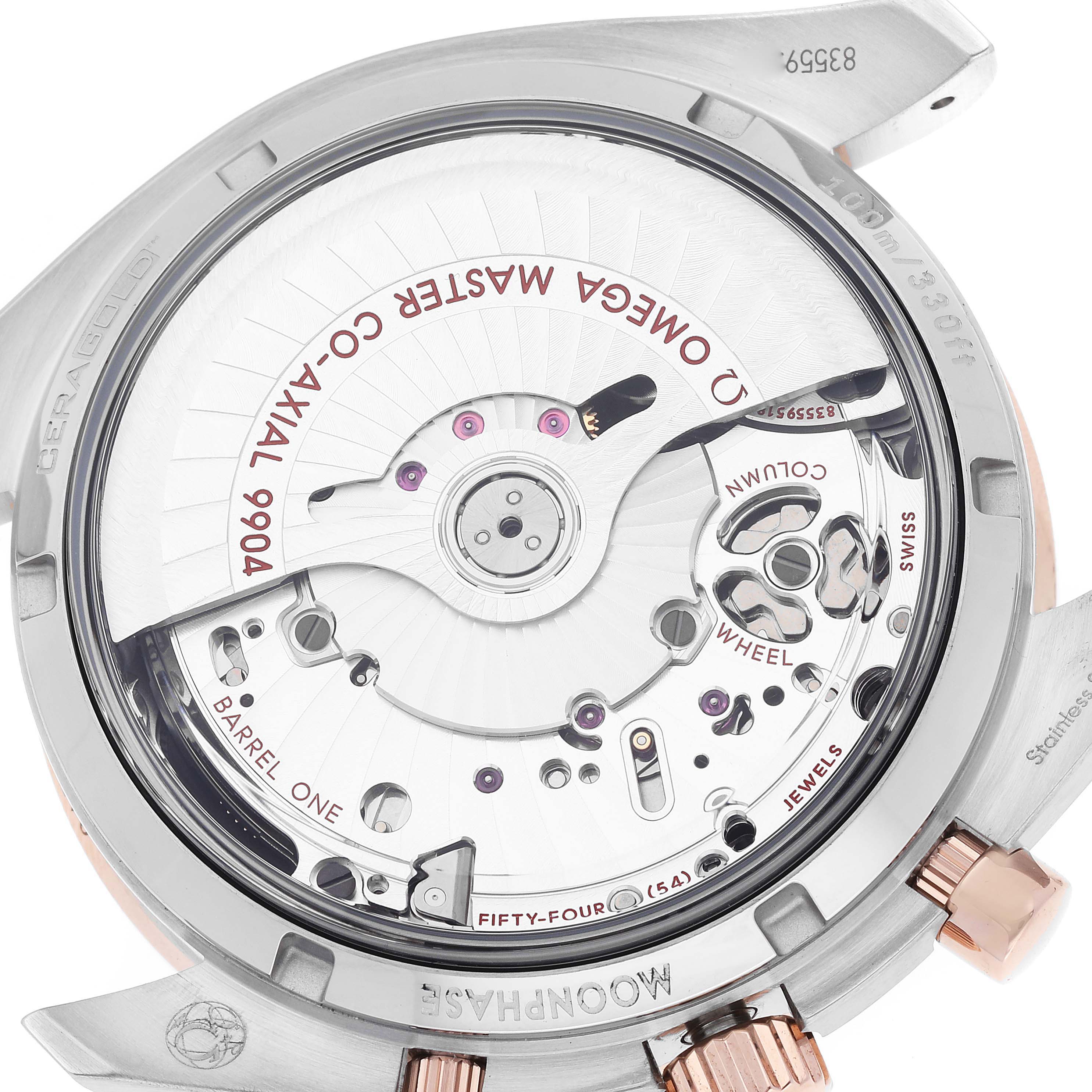 The image shows the caseback of the Omega Speedmaster 304.23.44.52.13.001 Men's Stainless Steel Brown Dial 304.23.44.52.13.001 Men's Stainless Steel Brown Dial, highlighting its 9904 Co-Axial Master Chronometer movement.