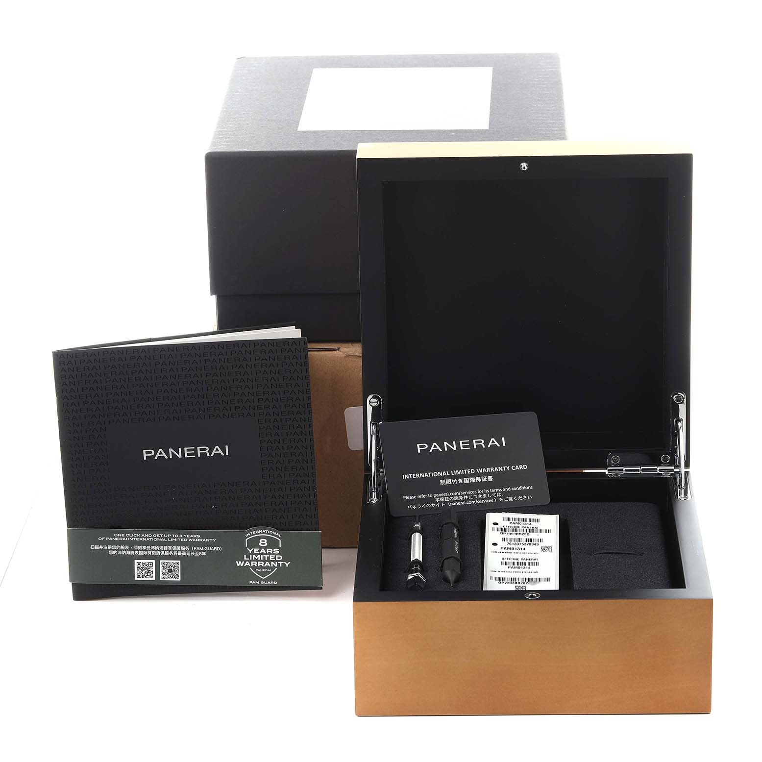 The image shows an open Panerai Luminor PAM01314 Men
s Stainless Steel White Dial PAM01314 Men
s Stainless Steel White Dial box with warranty card, booklet, and tools at an angle highlighting the contents.
