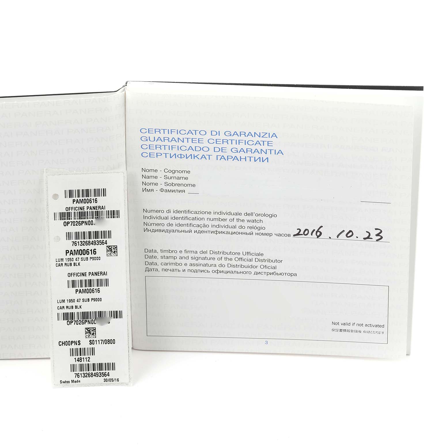 The image shows a warranty certificate and tags for a Panerai Submersible PAM00616 Men's Ceramic Black Dial PAM00616 Men's Ceramic Black Dial watch in a close-up angle.