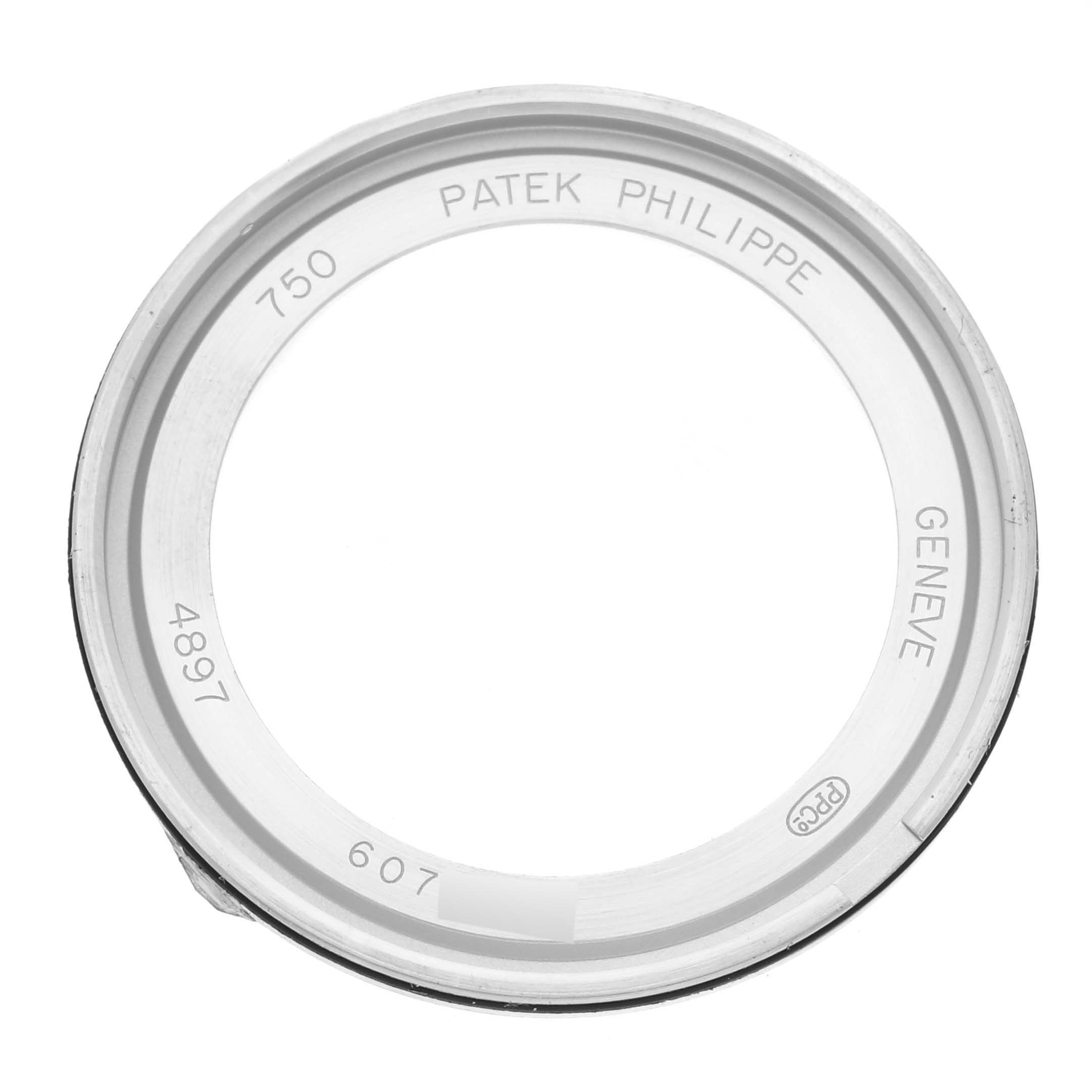 The image shows the bezel of a Patek Philippe Calatrava 4897G-010 Women's White Gold Grey Dial 4897G-010 Women's White Gold Grey Dial watch viewed from above.