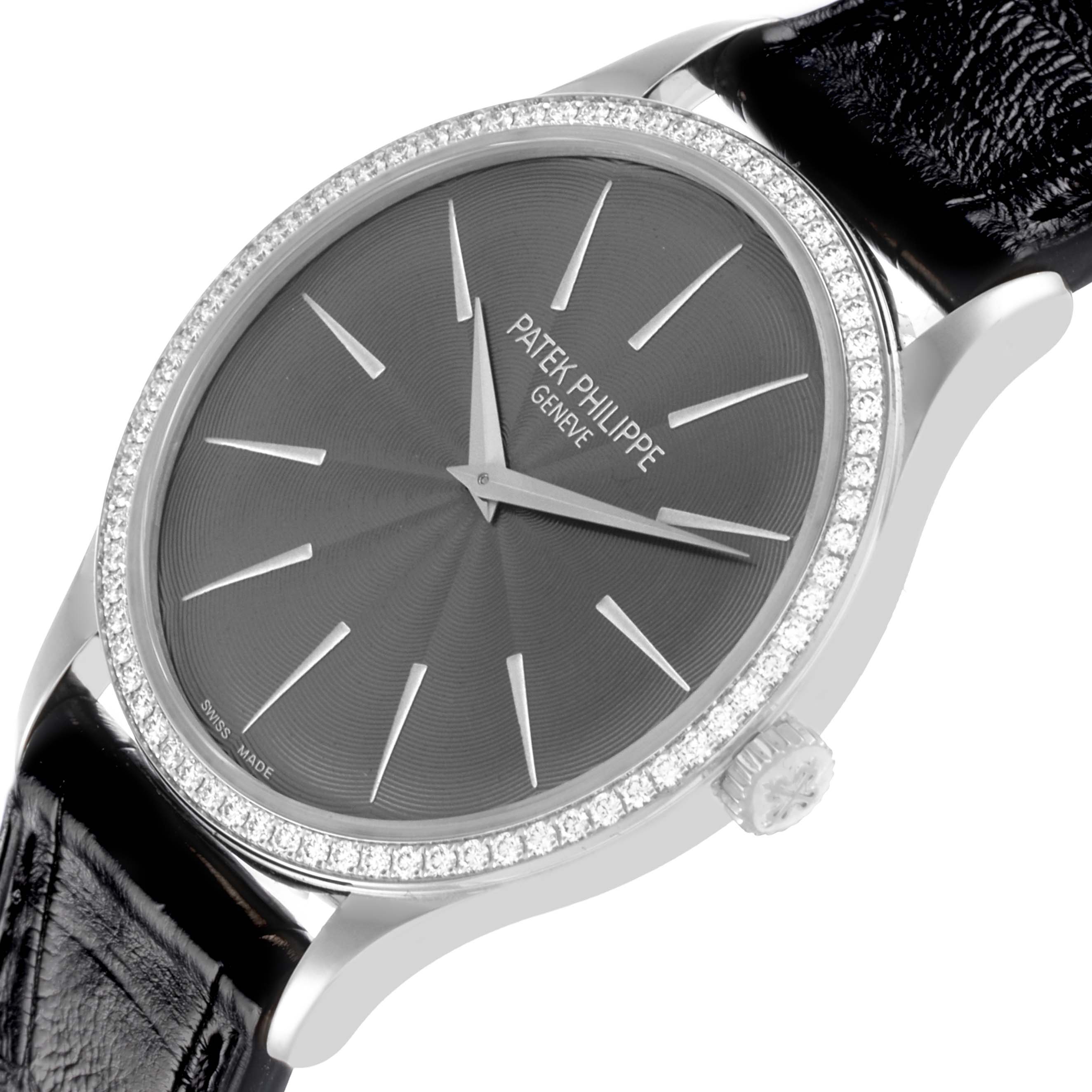 The Patek Philippe Calatrava 4897G-010 Women's White Gold Grey Dial 4897G-010 Women's White Gold Grey Dial watch is shown from an angled view highlighting the face, bezel, crown, and leather strap.