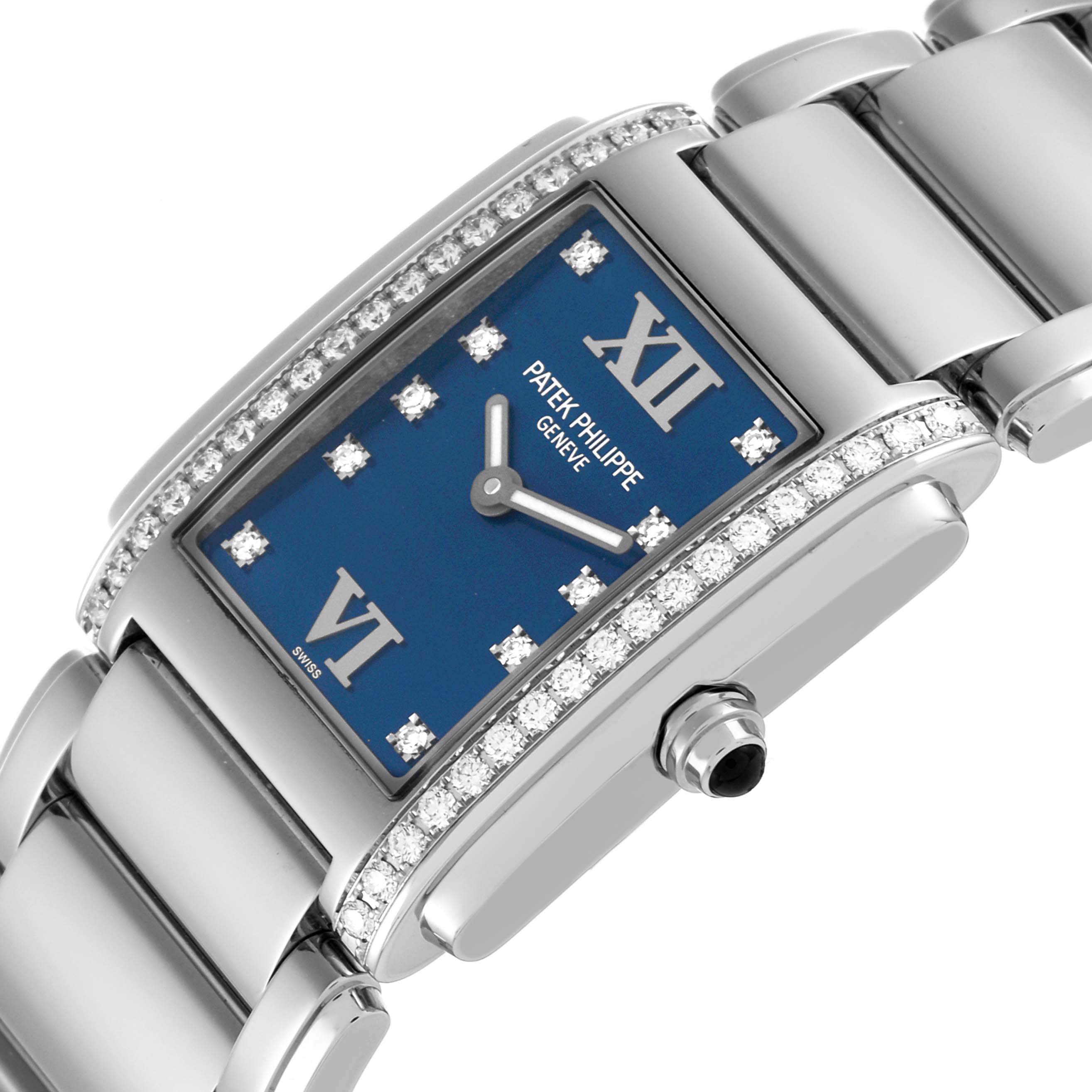 The image shows the Patek Philippe Twenty-4 4910/10 Women's Stainless Steel Blue Dial 4910/10 Women's Stainless Steel Blue Dial watch at an angled view, highlighting the dial, bracelet, and diamond accents.