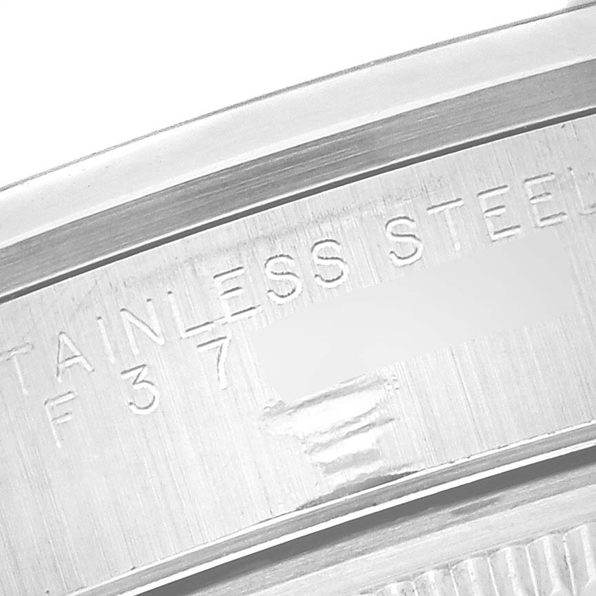 The image shows a close-up of the case back engravings of the Rolex Air-King 14000 Men's Stainless Steel Black Dial 14000 Men's Stainless Steel Black Dial, highlighting the "STAINLESS STEEL" text.