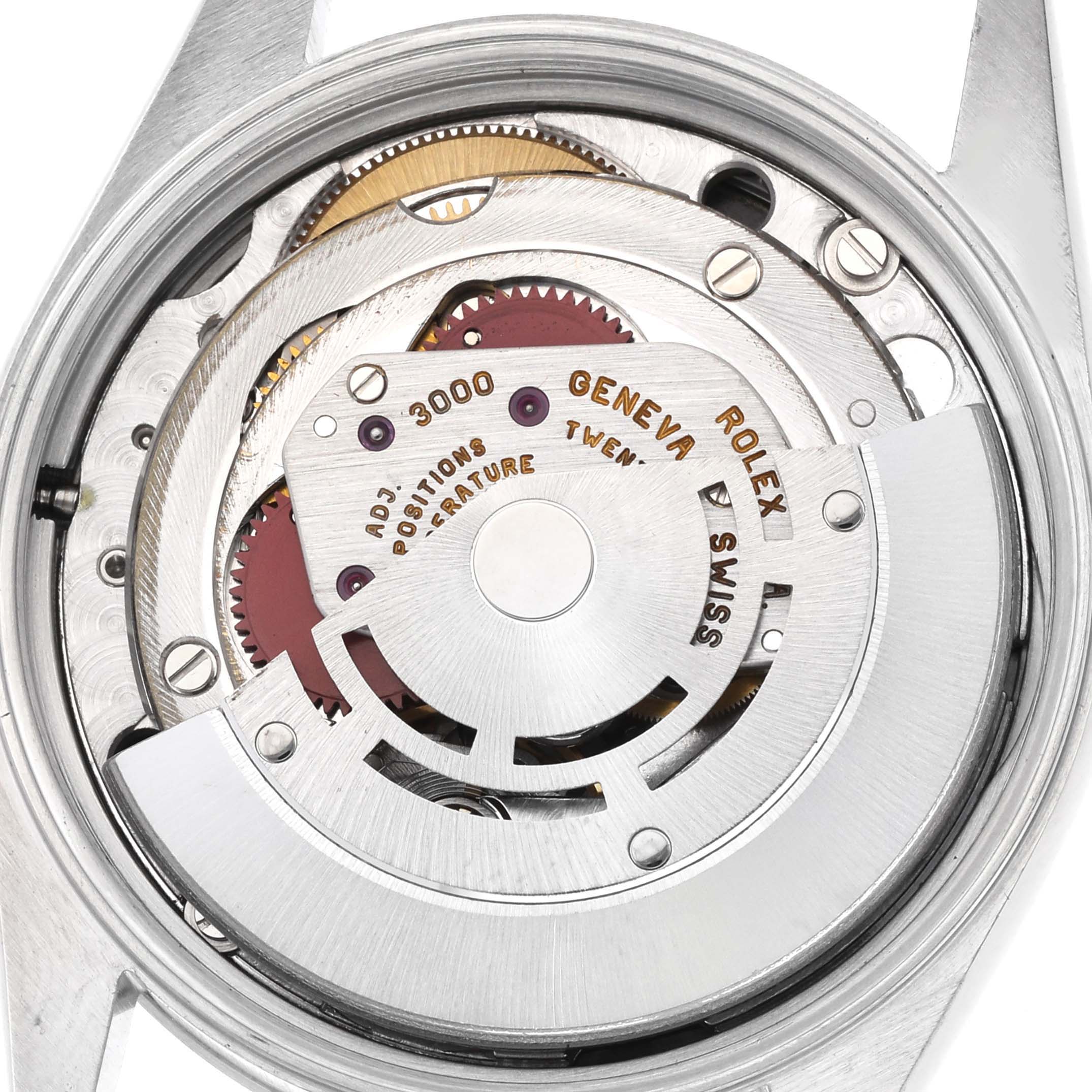 The image shows the back view of a Rolex Air-King 14000 Men's Stainless Steel Black Dial 14000 Men's Stainless Steel Black Dial watch, focusing on its mechanical movement and rotor.