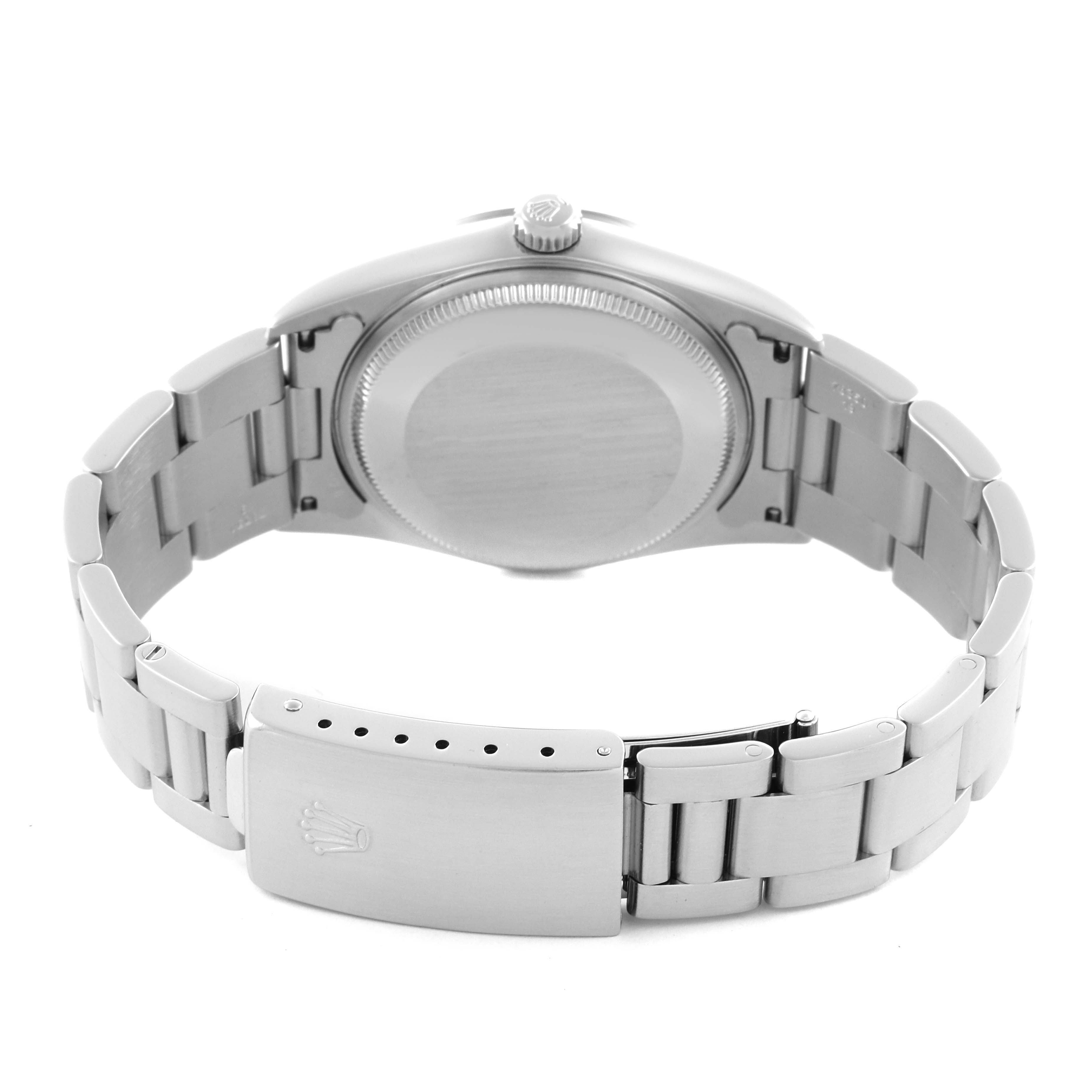 The image shows the back view of a Rolex Air-King 14000M Men's Stainless Steel Black Dial 14000M Men's Stainless Steel Black Dial, displaying the case back and bracelet with clasp.