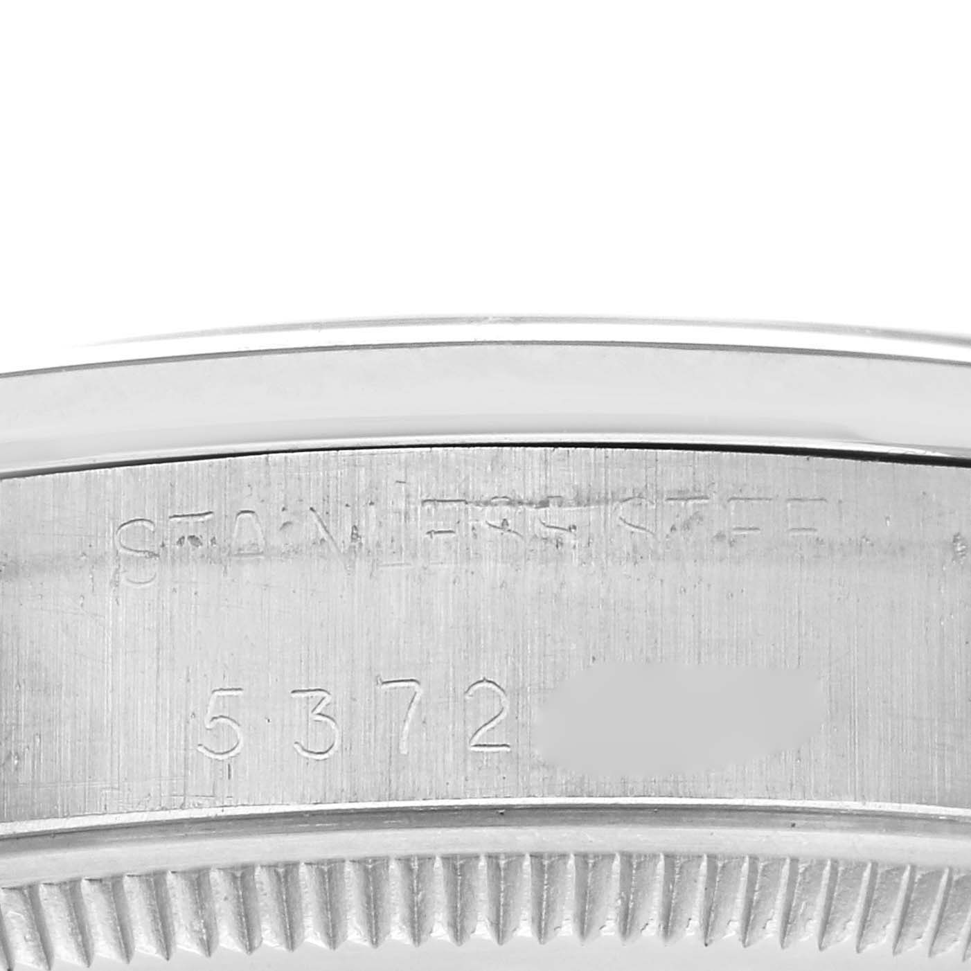 The image shows a close-up of the case back edge of a Rolex Vintage Collection 5500 Men's Stainless Steel Silver Dial 5500 Men's Stainless Steel Silver Dial watch, with part of the serial number visible.