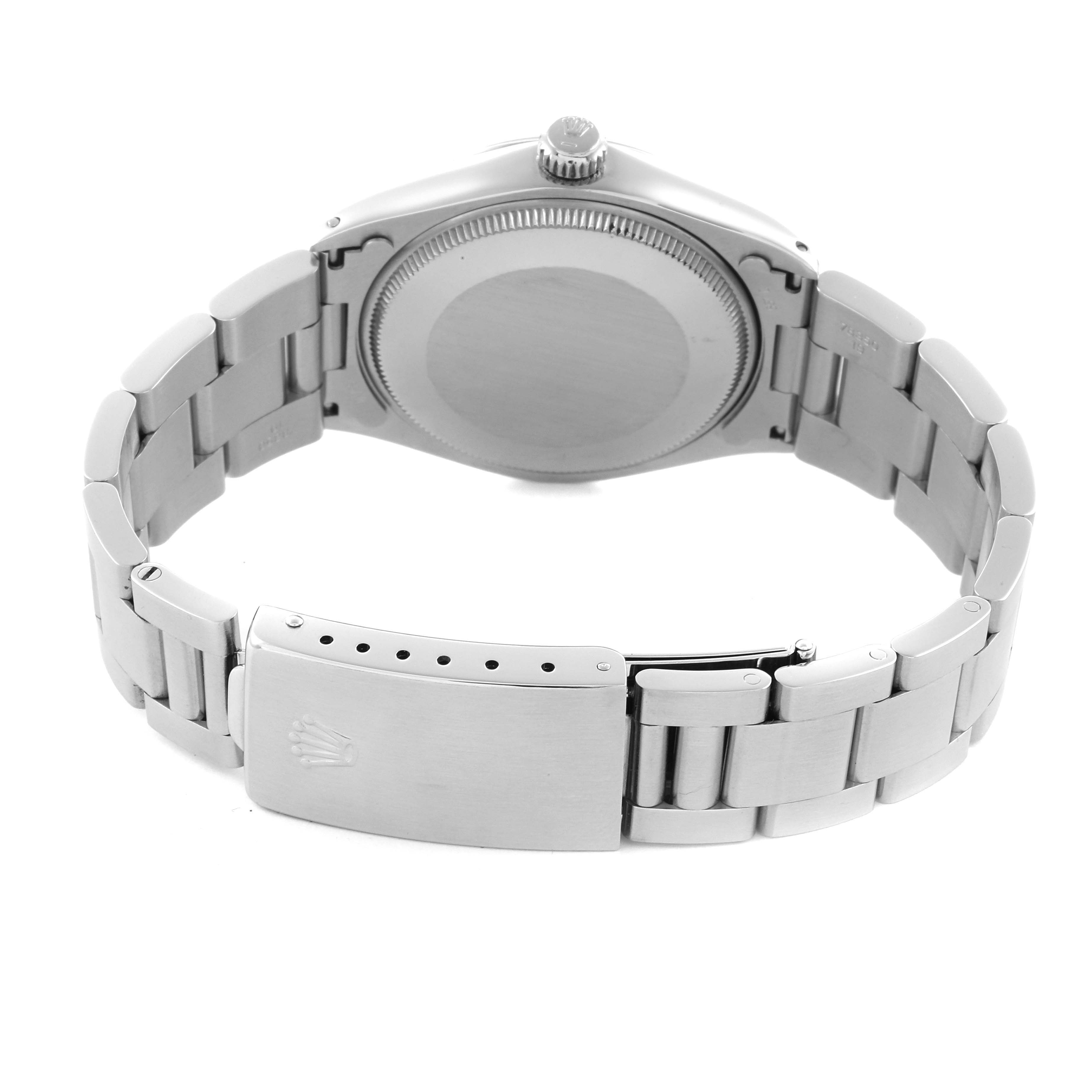 The image shows the back view of a Rolex Vintage Collection 5500 Men's Stainless Steel Silver Dial 5500 Men's Stainless Steel Silver Dial watch, highlighting the case back and metal bracelet clasp.