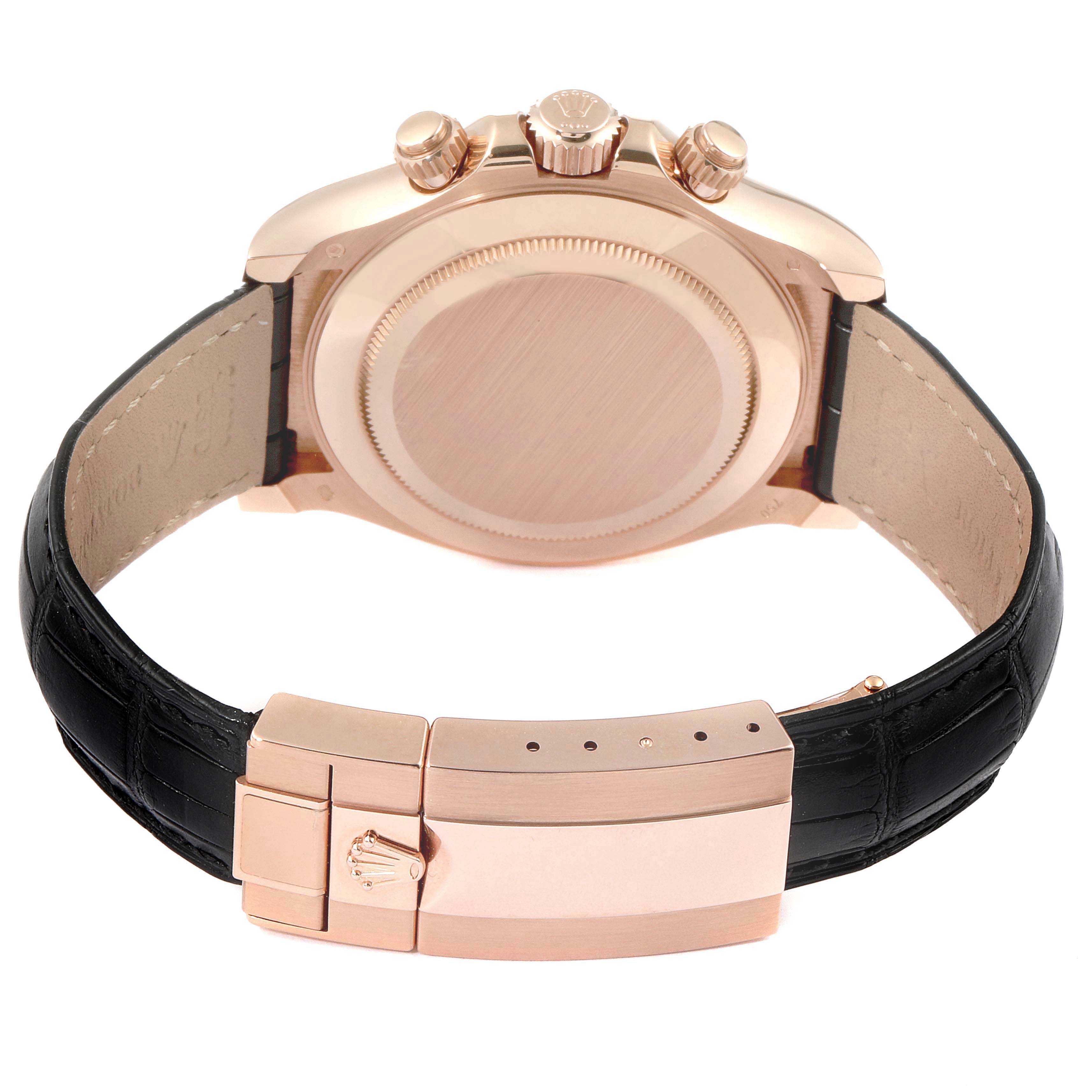 The image shows the back view of a Rolex Daytona 116515LN Men's Rose Gold Silver Dial 116515LN Men's Rose Gold Silver Dial watch, highlighting the case back, crown, and black leather strap with a clasp.