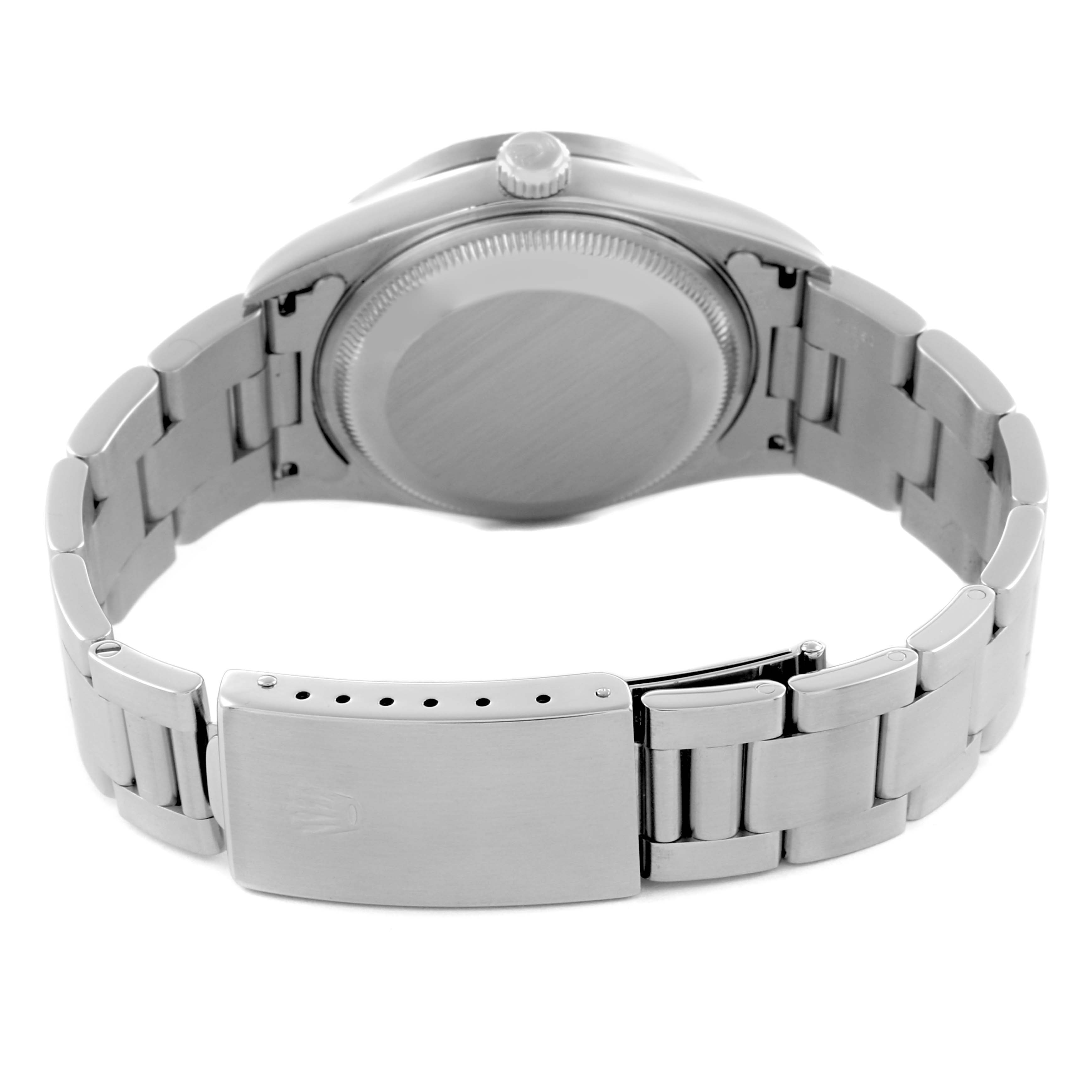 The image shows the back and bracelet of a Rolex Date 15210 Men
s Stainless Steel Black Dial 15210 Men
s Stainless Steel Black Dial, highlighting its clasp and case back.