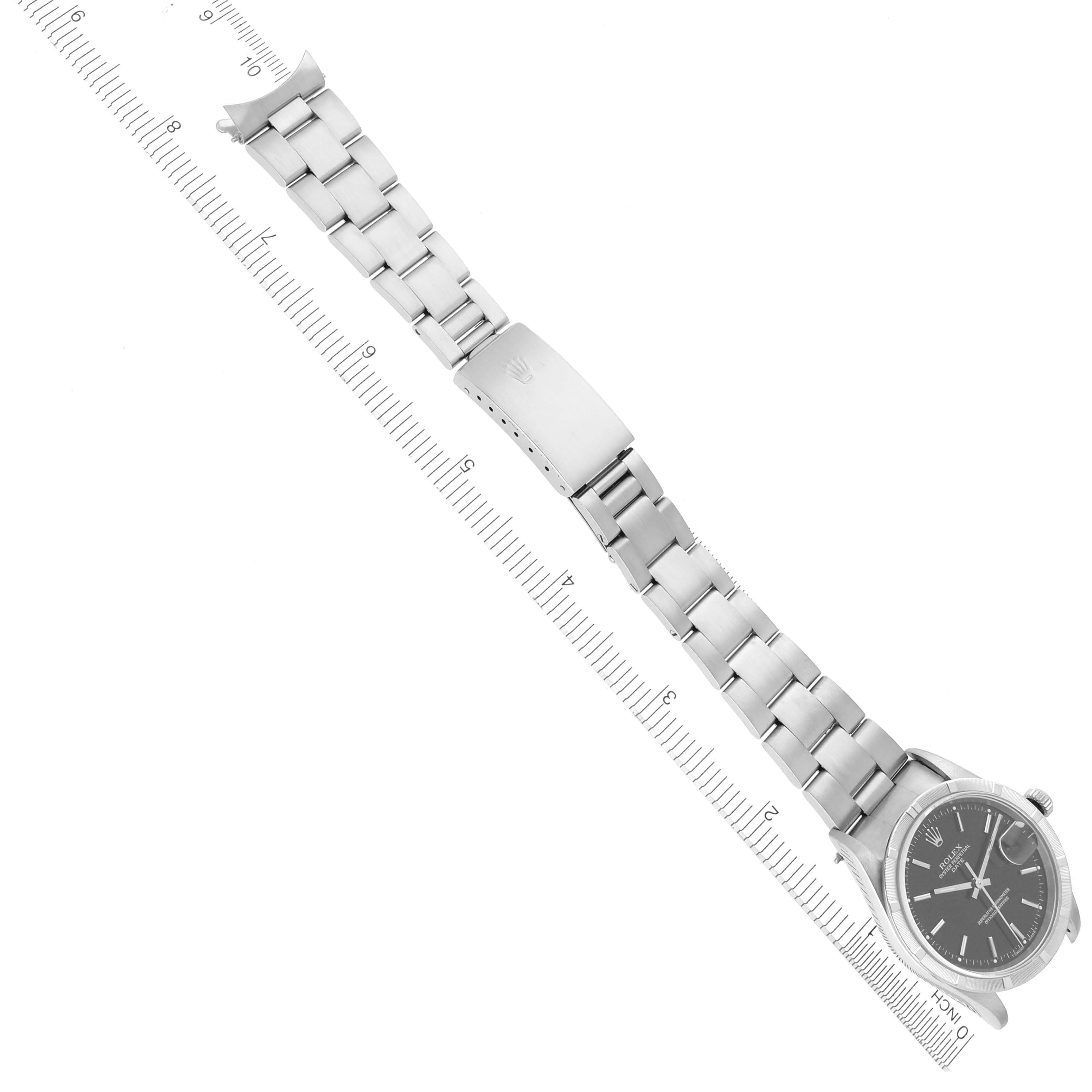 The Rolex Date 15210 Men
s Stainless Steel Black Dial 15210 Men
s Stainless Steel Black Dial watch is shown at a diagonal angle, displaying the full bracelet and clasp.