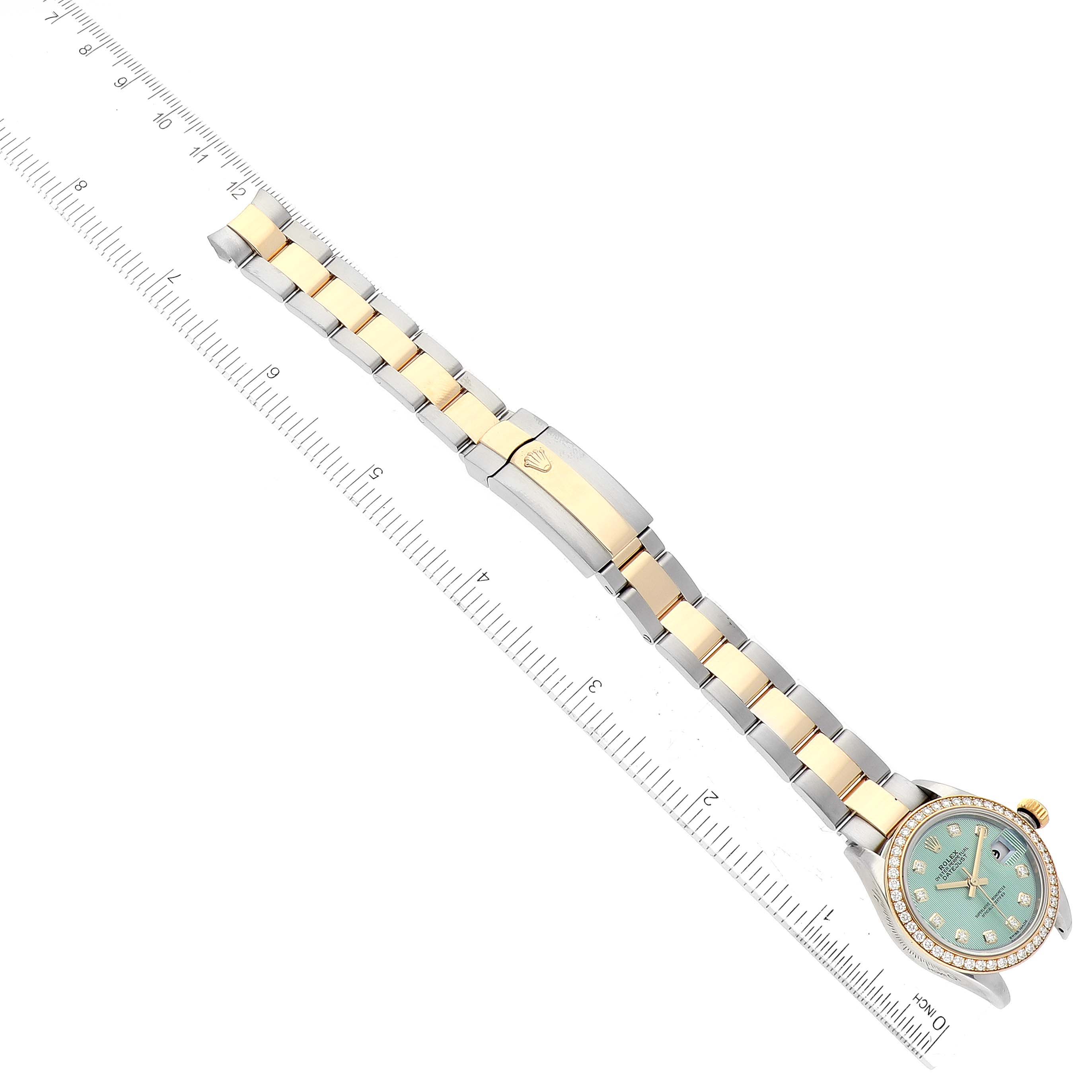 The image shows a Rolex Datejust 279383 Women's Steel and Gold (two tone) Green Dial 279383 Women's Steel and Gold (two tone) Green Dial watch laid flat with a ruler next to it, displaying the face, bezel, and bracelet.