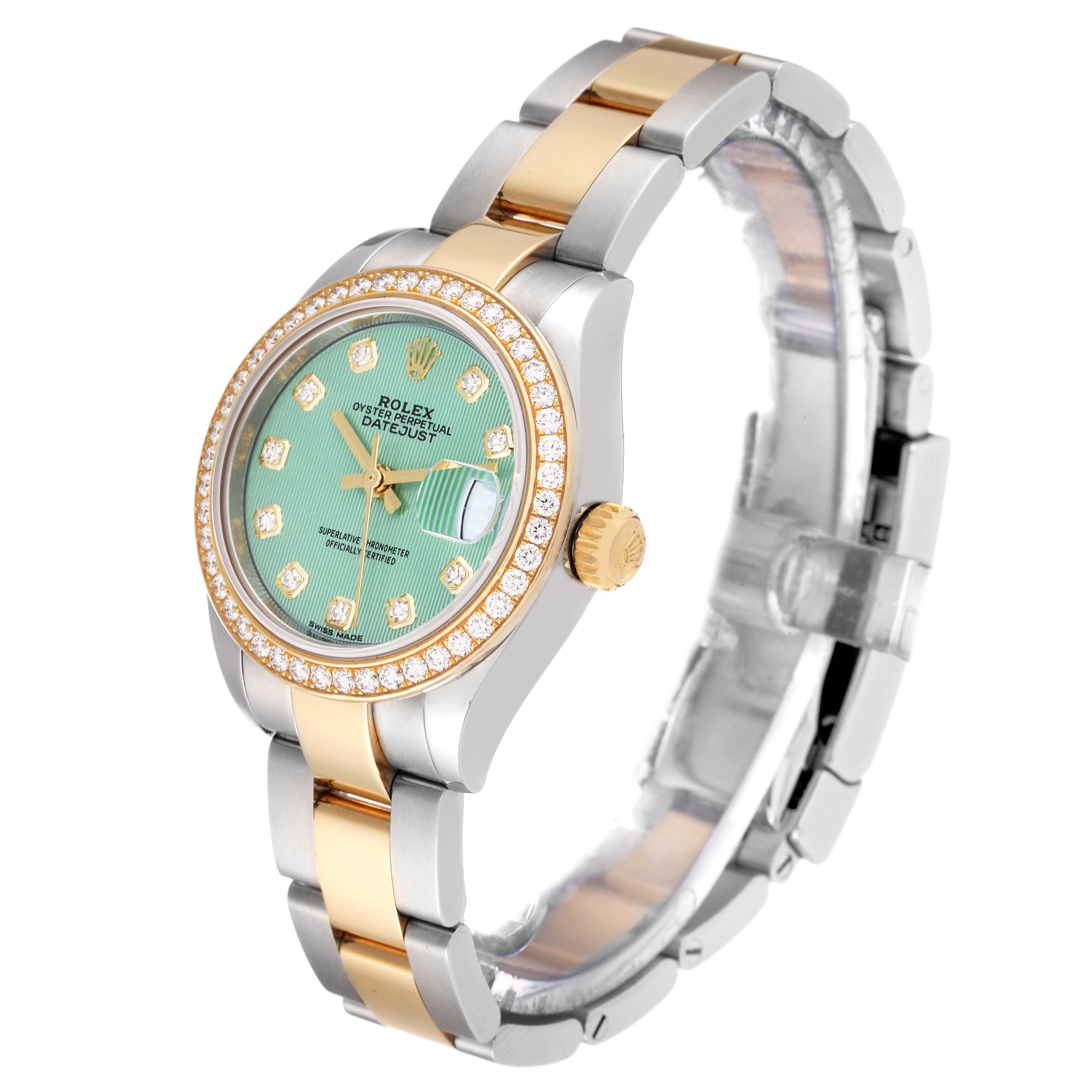 This image shows a side angle of the Rolex Datejust 279383 Women's Steel and Gold (two tone) Green Dial 279383 Women's Steel and Gold (two tone) Green Dial watch, displaying its dial, bezel, crown, and bracelet.